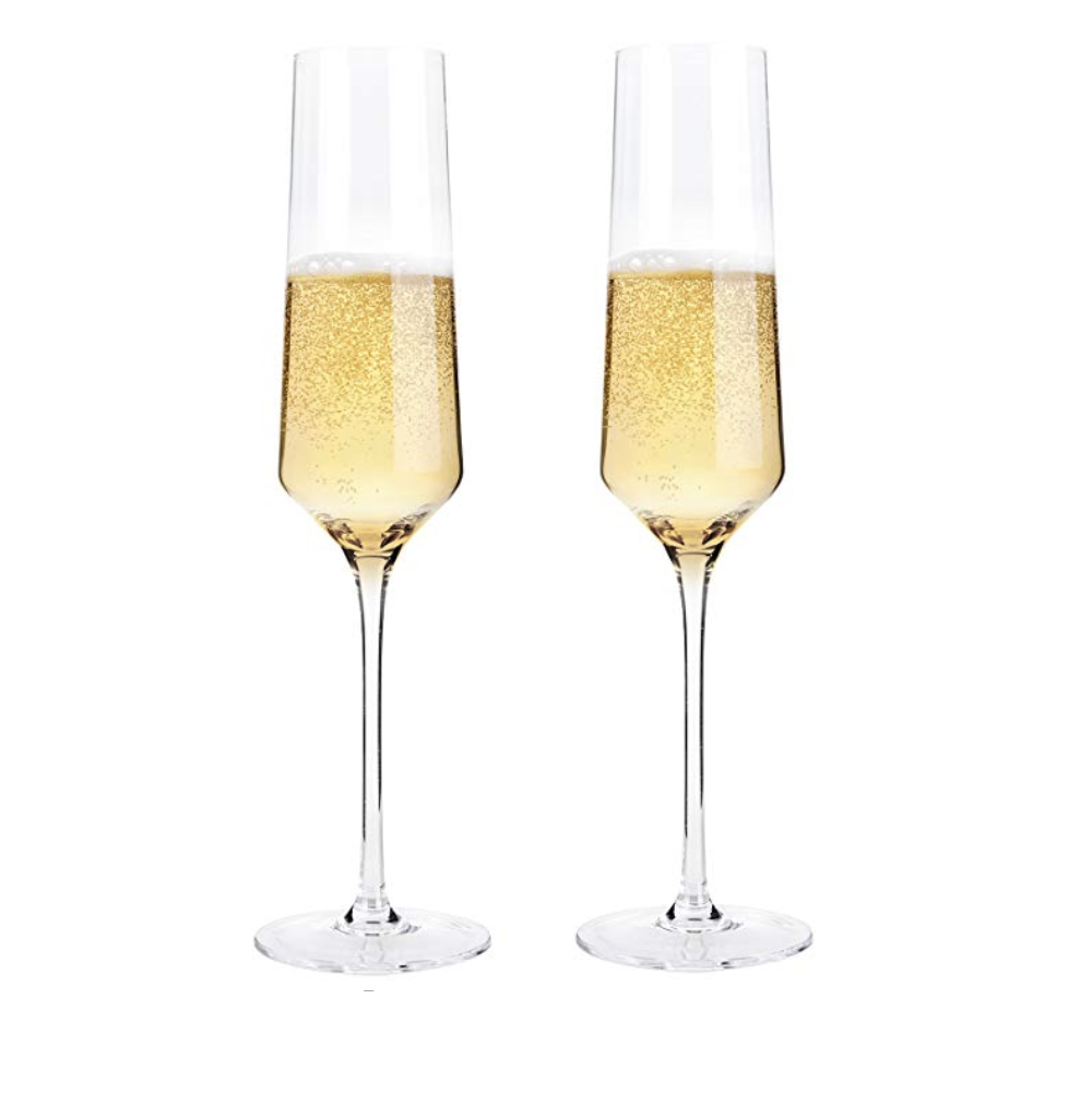 Champagne Flutes - Engagements and weddings mean lots of toasts in your honor, so say cheers with these hand blown crystal champagne glasses. Raise a glass with them at your wedding and save them for sipping champagne on your anniversary for years to come.