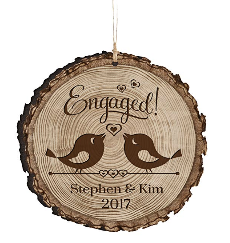 Personalized Engagement Ornament - Celebrate your engagement with this personalized engagement ornament. Featuring two sweet little lovebirds this wooden milestone ornament can be personalized to include your names and the date of your engagement.