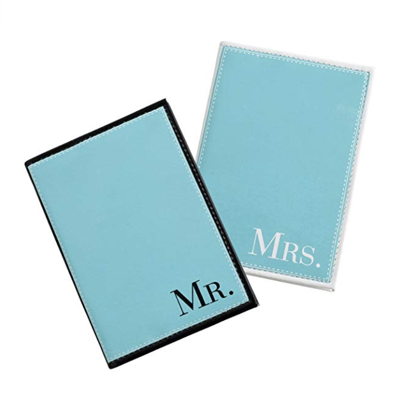 Mr. and Mrs. Passport Holders - Give your passports some panache with these matching Mr. and Mrs. passport holders. The blue leatherette passport covers fit standard size passports and are a perfect way to kick off your honeymoon in newlywed style.