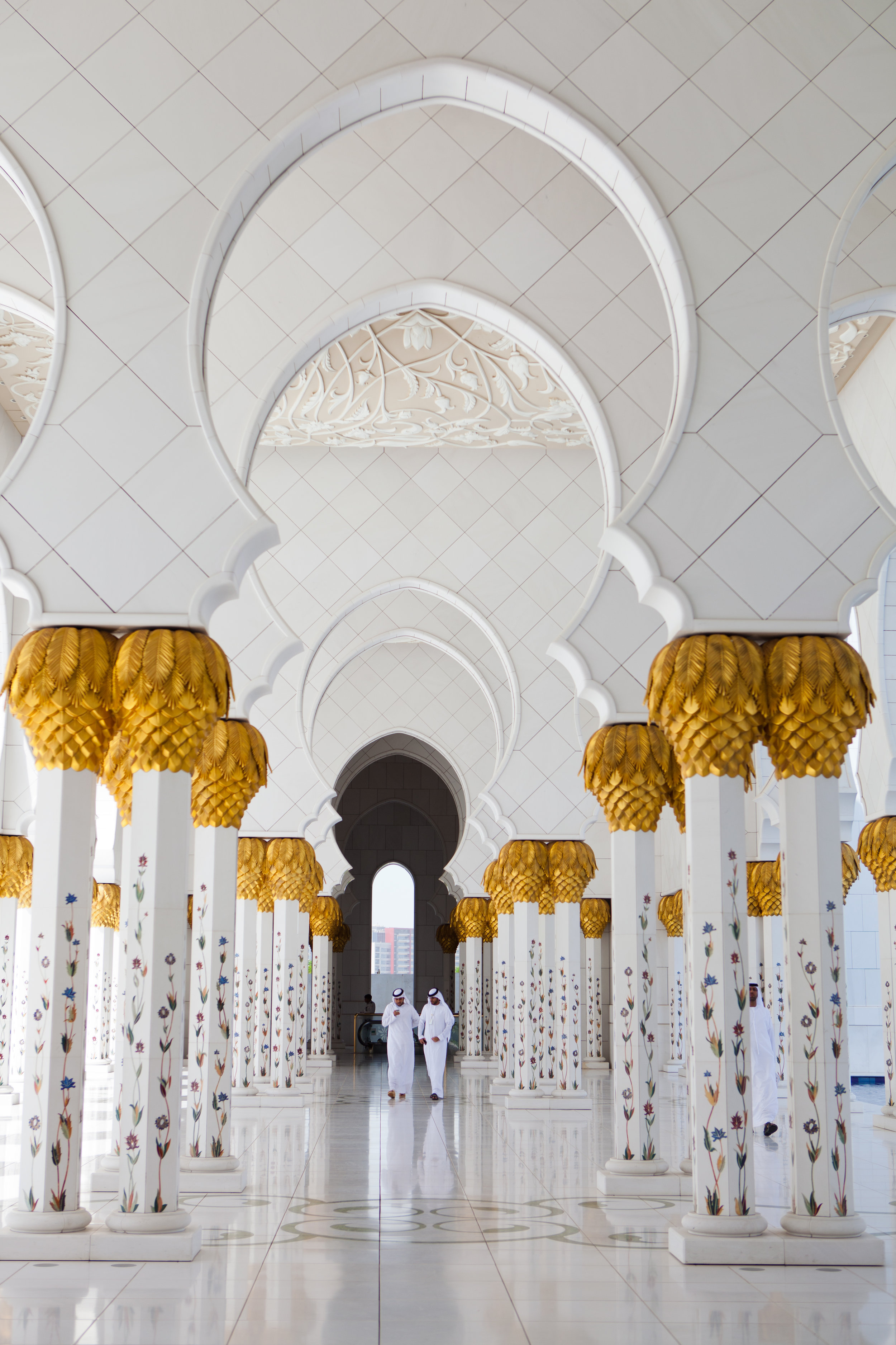 Had I not looked behind me while shooting the main portion of the Sheikh Zayed Grand Mosque in Abu Dhabi, I would have missed this moment between two local men.