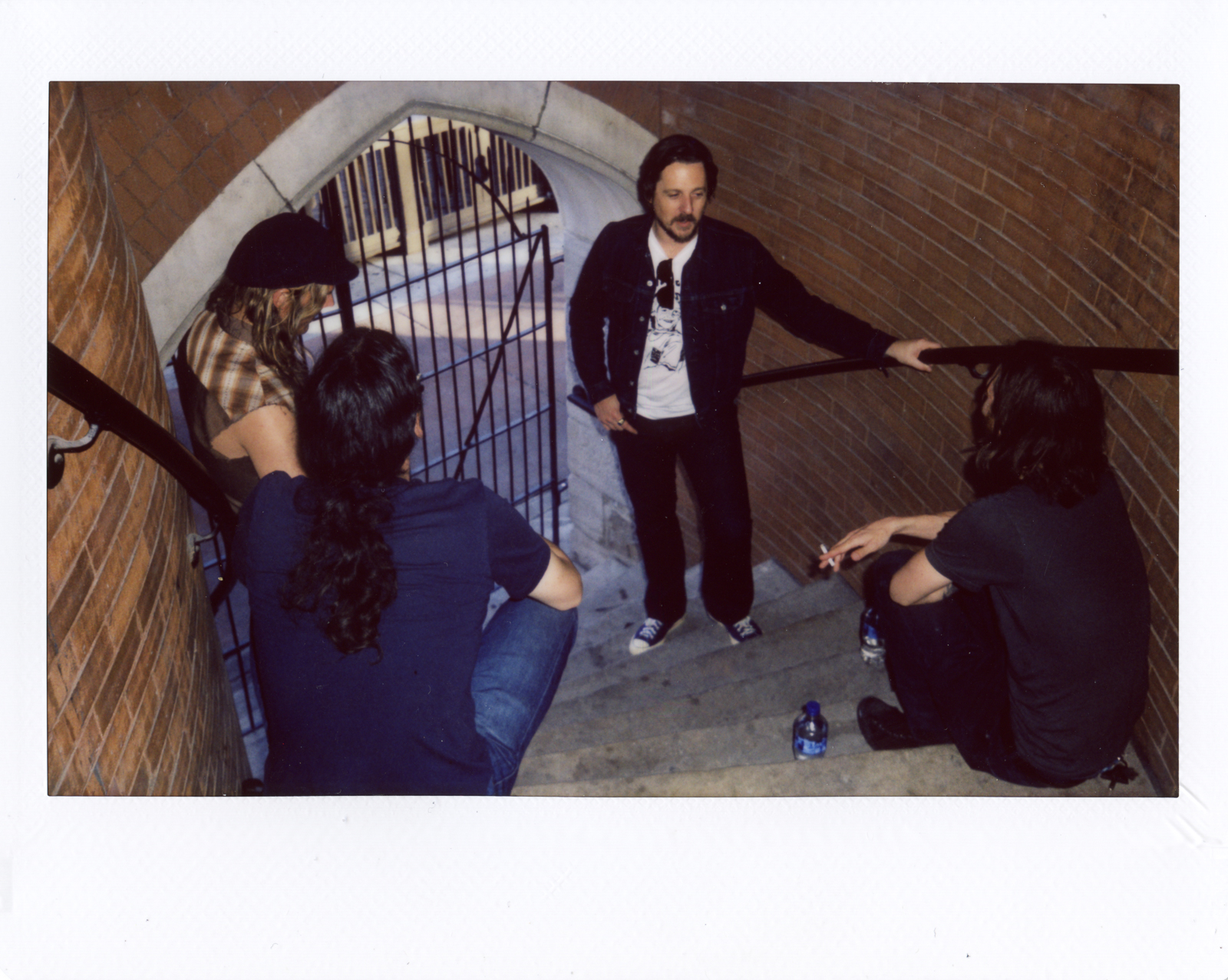 Kevin, Jamie, Sturgill, and Dillon on the back steps of the Ryman