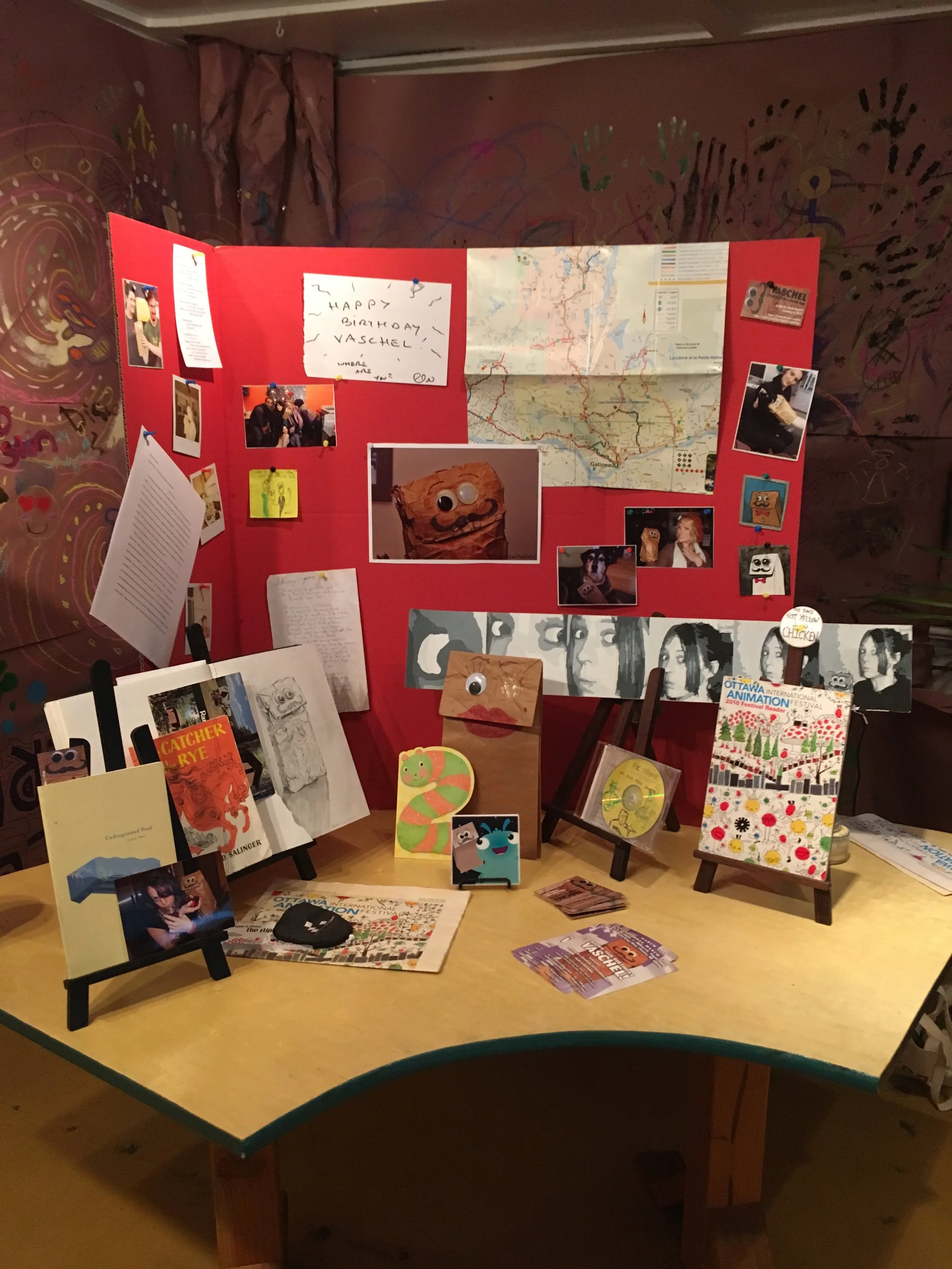The Musée de la Vaschel featured an assortment of artifacts documenting Vaschel’s life since March 2008. Notable items include Polaroids from a trip to visit his then-girlfriend in Boston (2009), a birthday message from filmmaker Don Hertzfeldt (2010), and the program from the 2010 Ottawa Animation Festival.