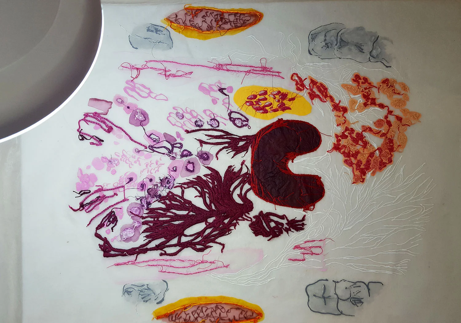 The back of the embroidery, after being washed with a gentle cleanser