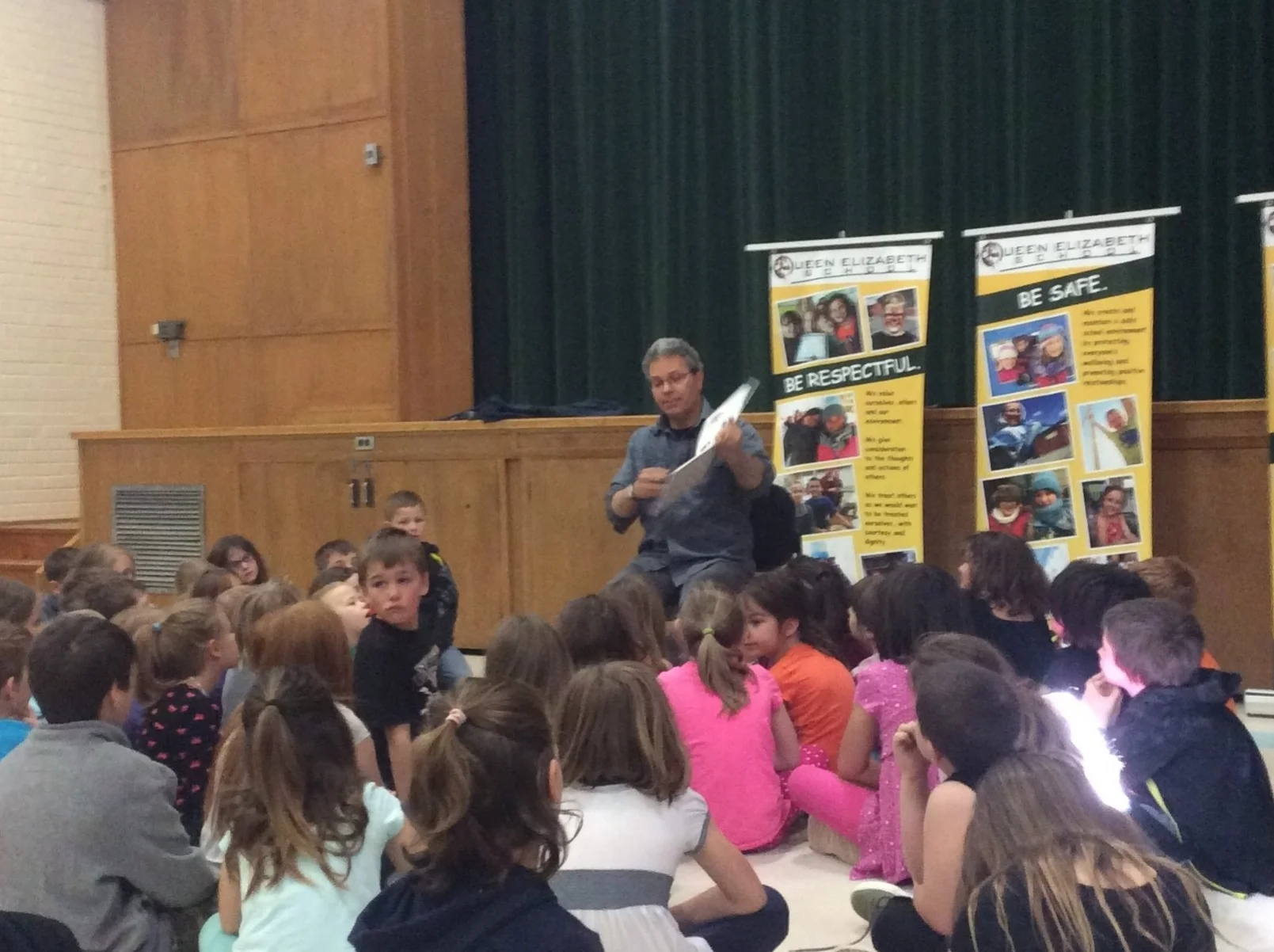 Cary Fagan reads his book Little Blue Chair to a rapt audience at Queen Elizabeth School, May 2017