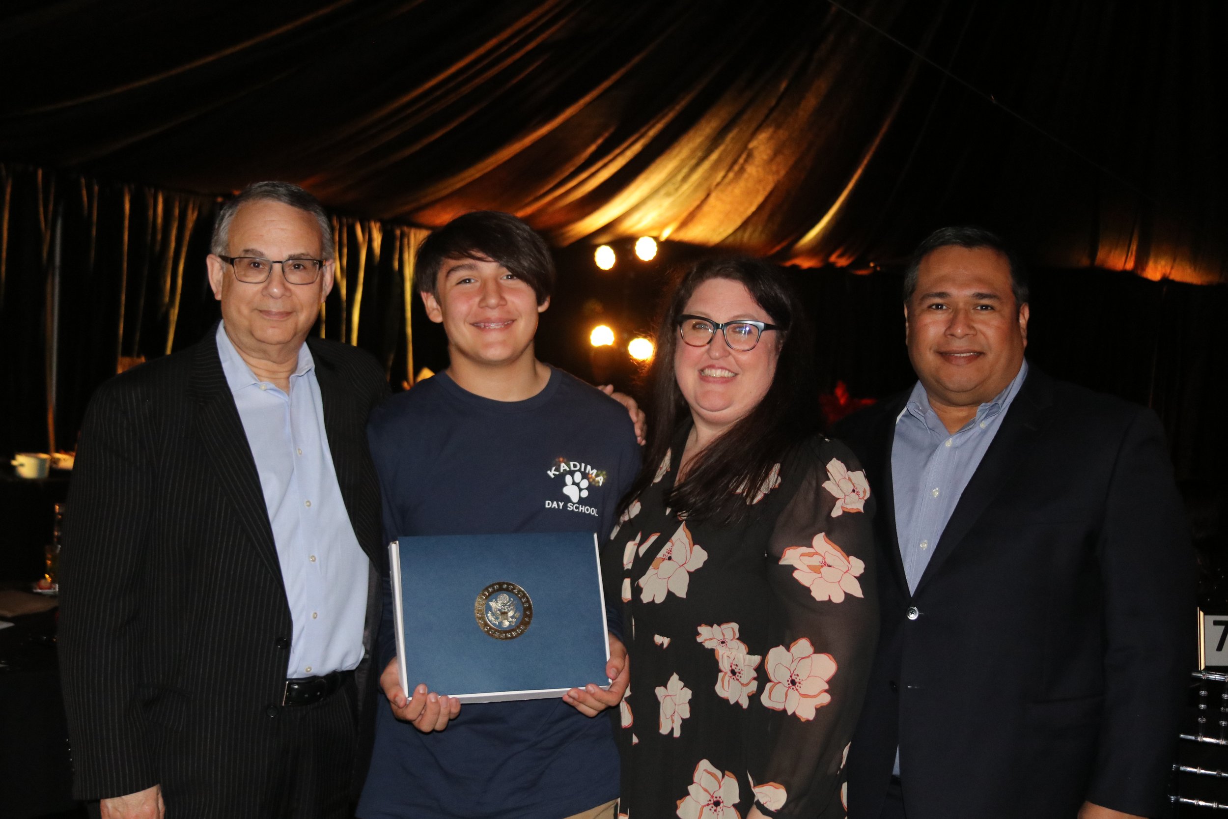 Harrison Guerrero received the flag from Congressman Sherman's office on behalf of Kadima Day School.JPG