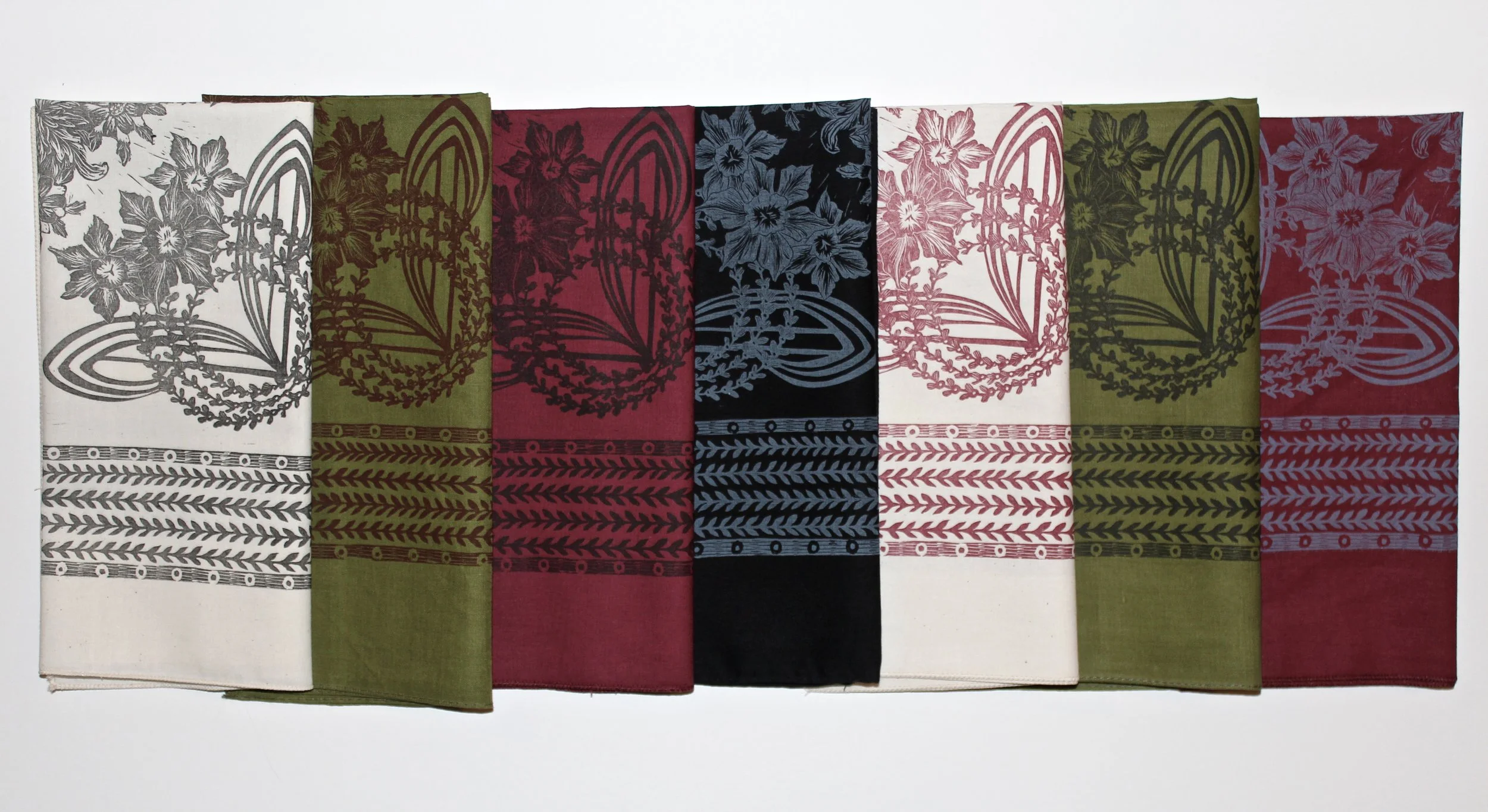 Left to right: Natural w/ black ink, olive green w/ burgundy ink, wine w/ black ink, black w/ polar sky ink, natural w/ burgundy ink, olive green w/ black ink, wine w/ polar sky ink