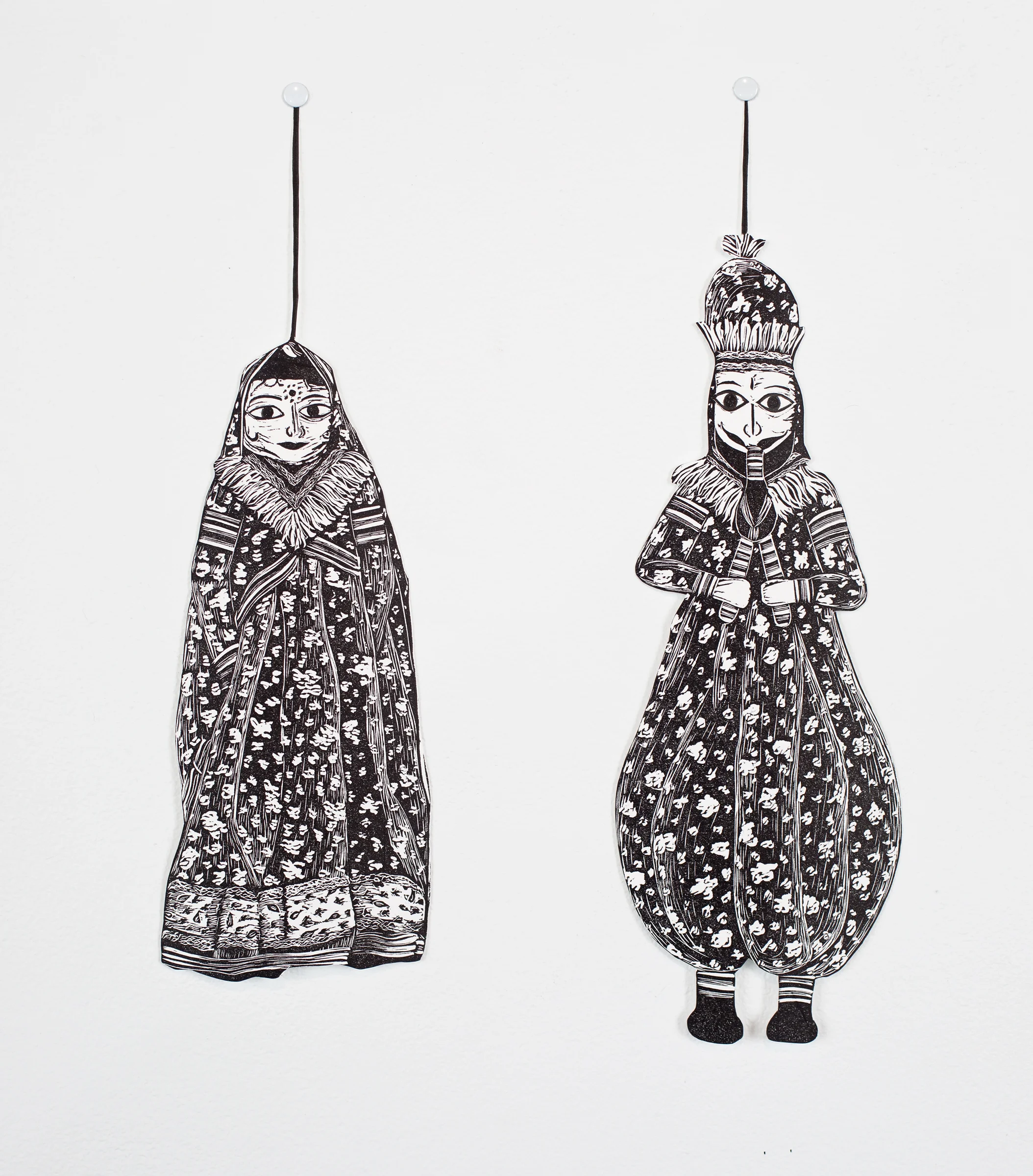 "Rajasthani Puppets", linoleum relief and hand cut out with Xacto, each puppet is around 4x10