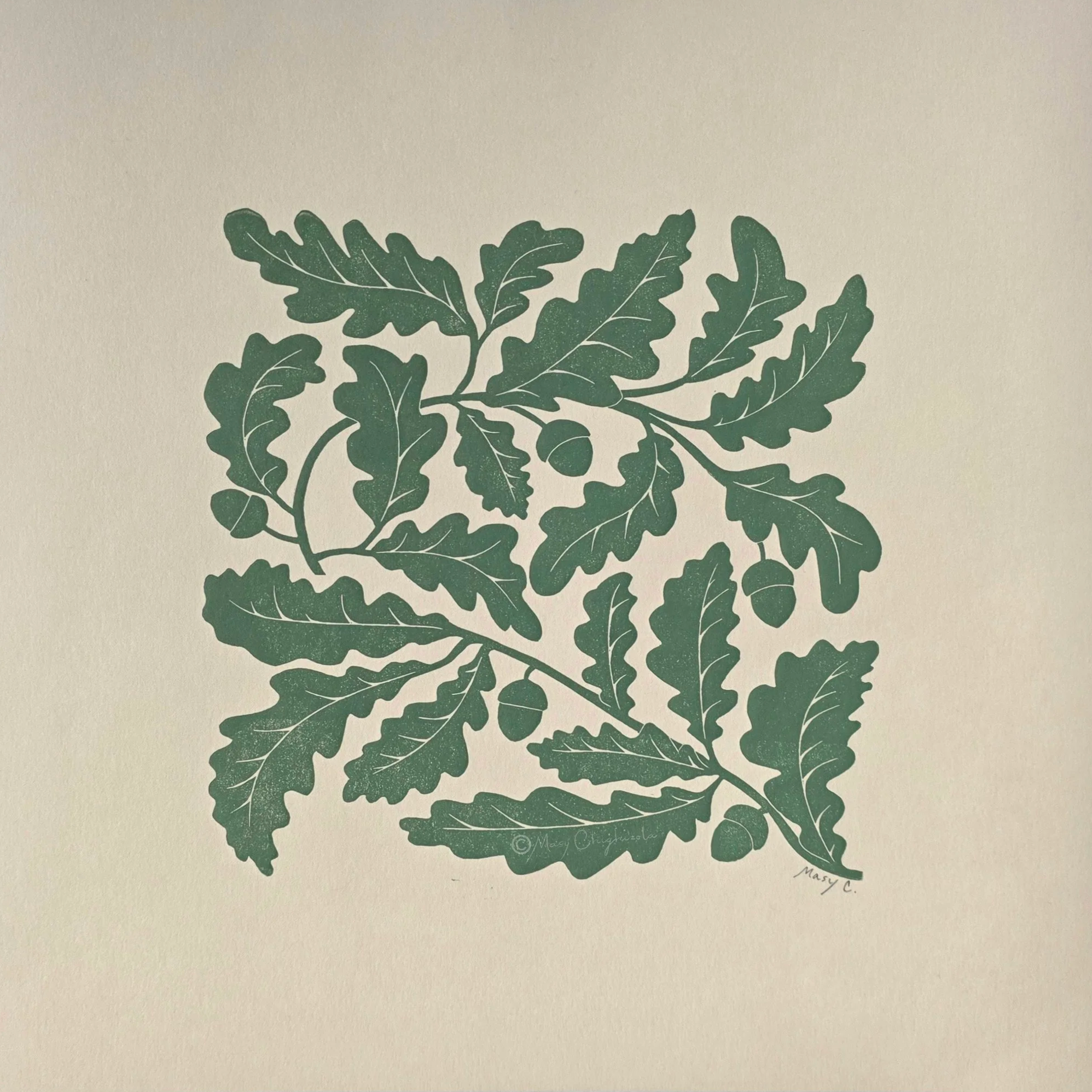 Nature-inspired 12x12 original block print featuring an oak tree branch with detailed leaves and acorns, hand printed in olive green ink on beige fine art paper.