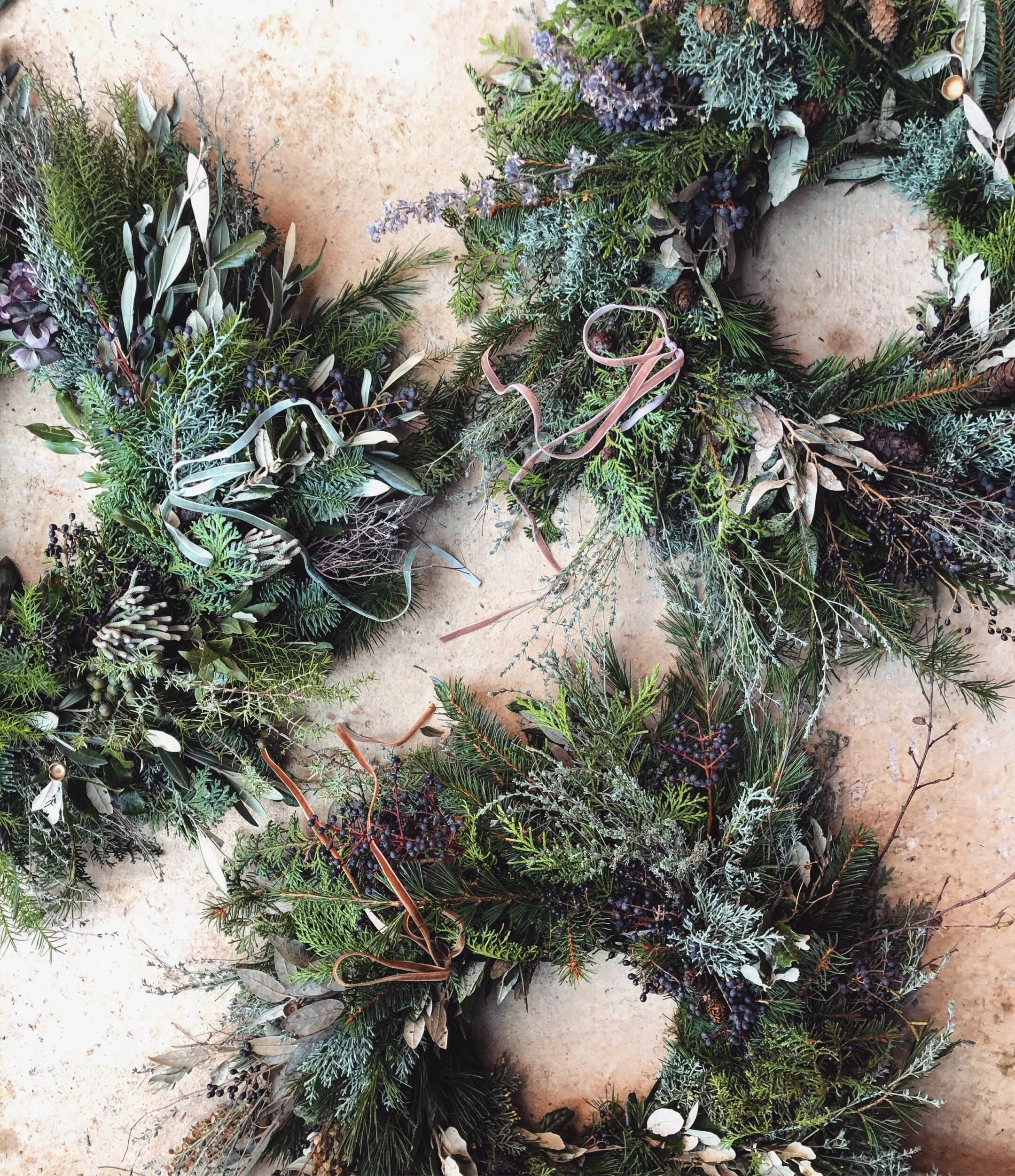 A trio of Norfolk made Christmas Wreaths 