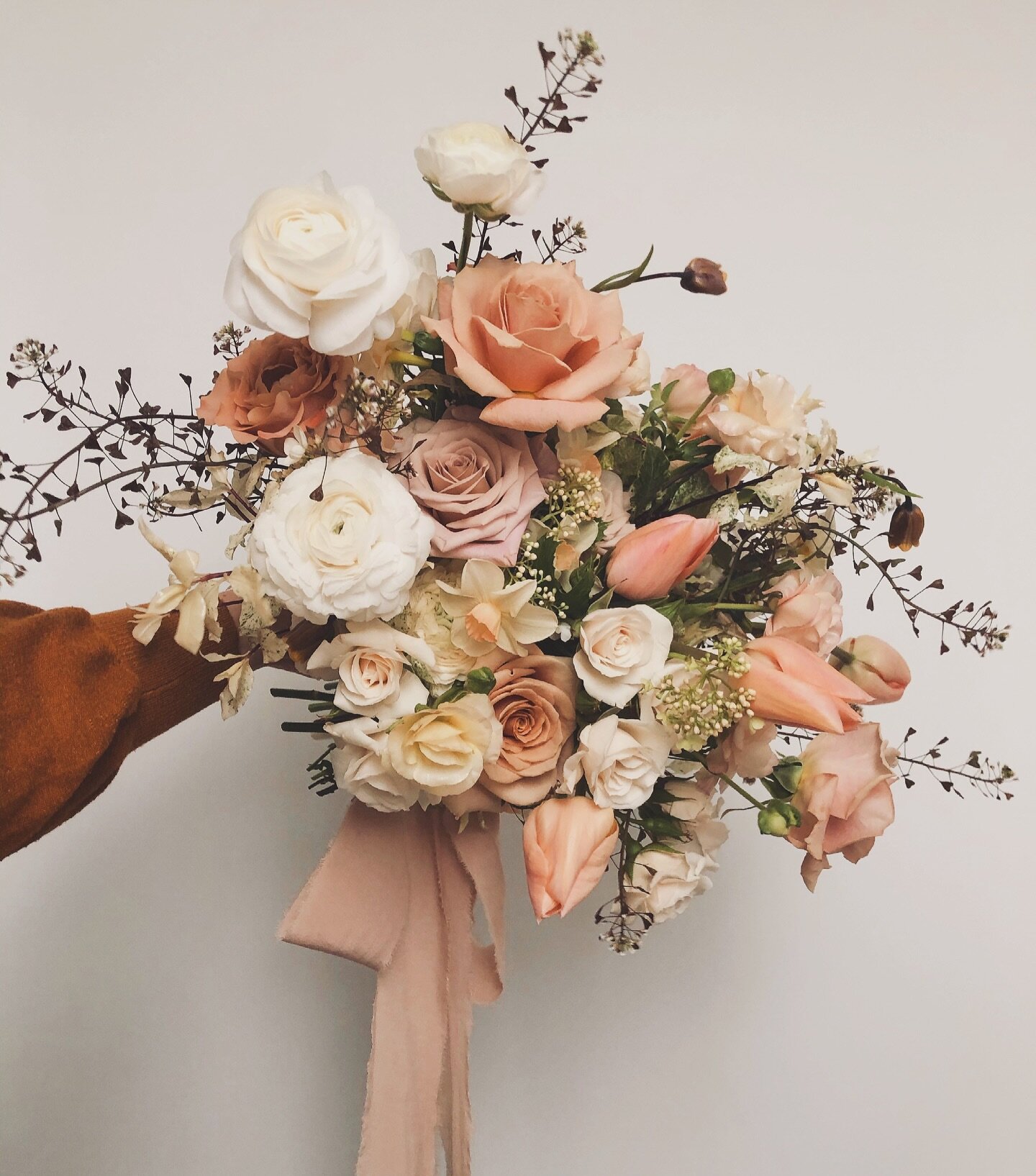 This spring bridal bouquet holds a cherished spot in my heart. It marked the first wedding I had the joy of creating post-Covid. I&rsquo;ll never forget the sheer delight I felt as I immersed myself in blooms after such a long time.
