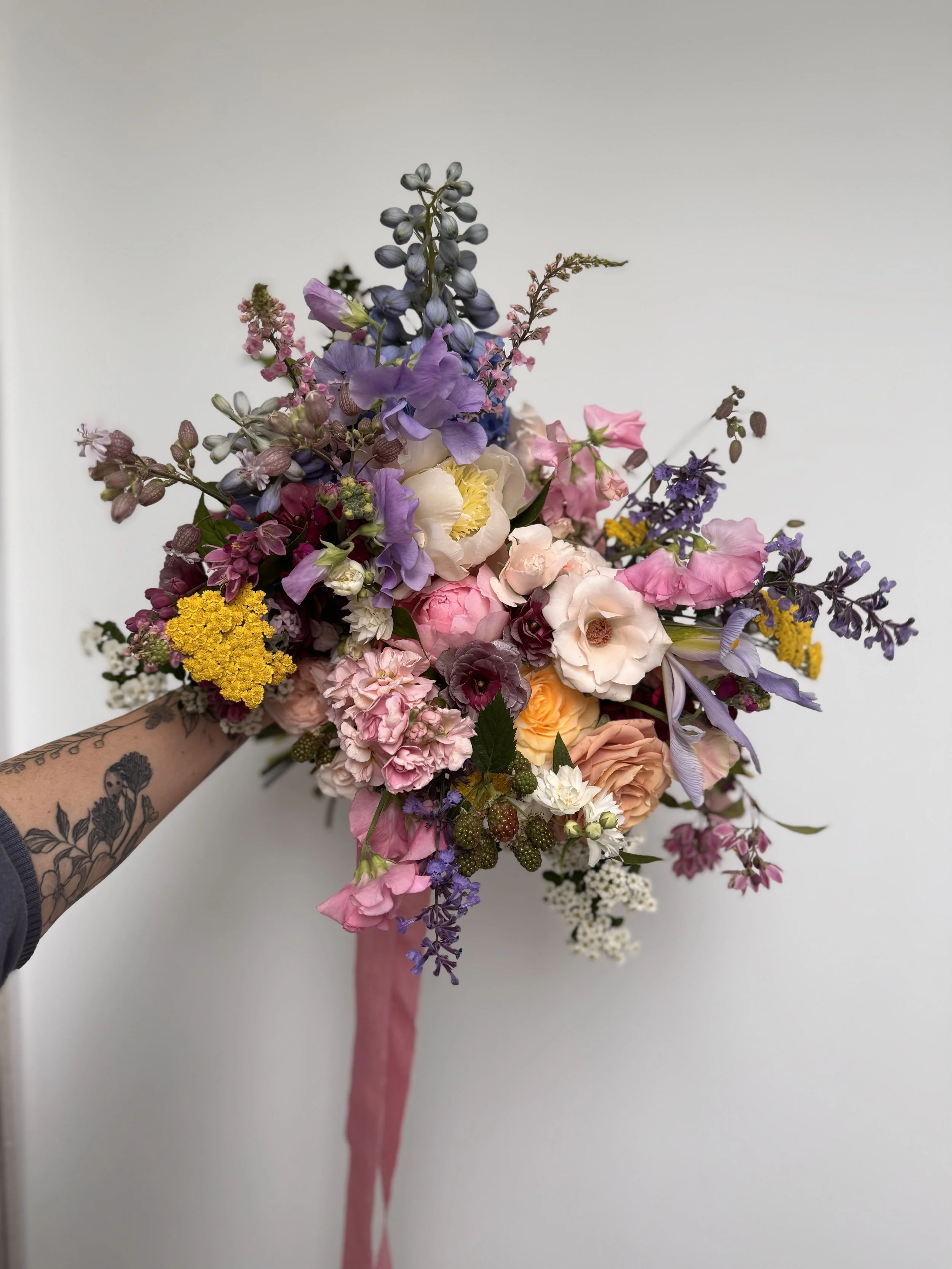 colourful seasonal bridal bouquet in Norfolk.jpeg