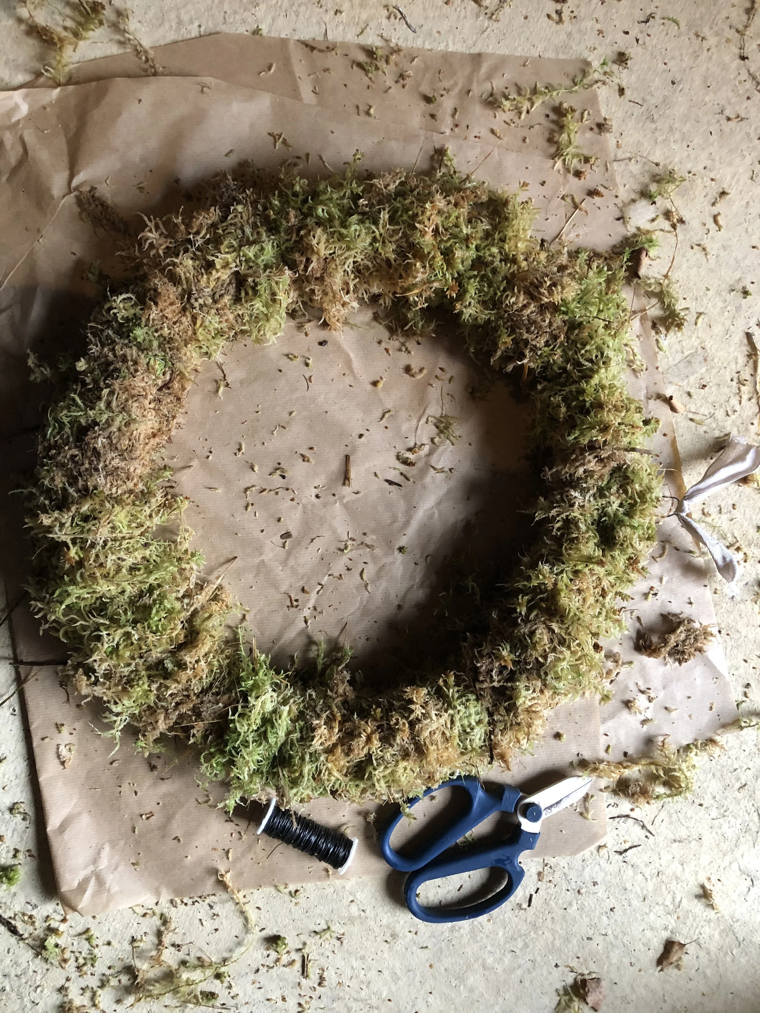 A raw traditional moss base ready for our christmas wreath workshops at Voewood House in North Norfolk