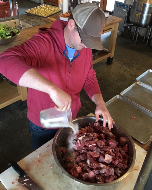 Here I am, mixing the dry ingriedients with the really cold chunks of venison and pork butt.