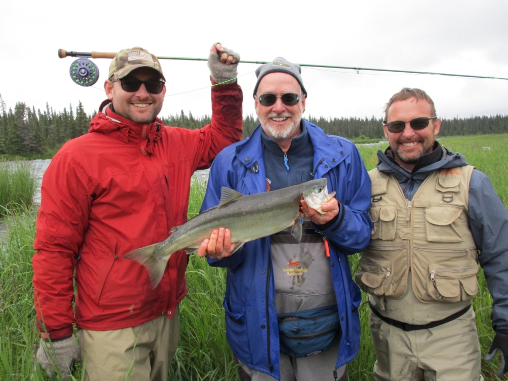 Thaddeus, Uncle Brian with a sockeye and Noah.