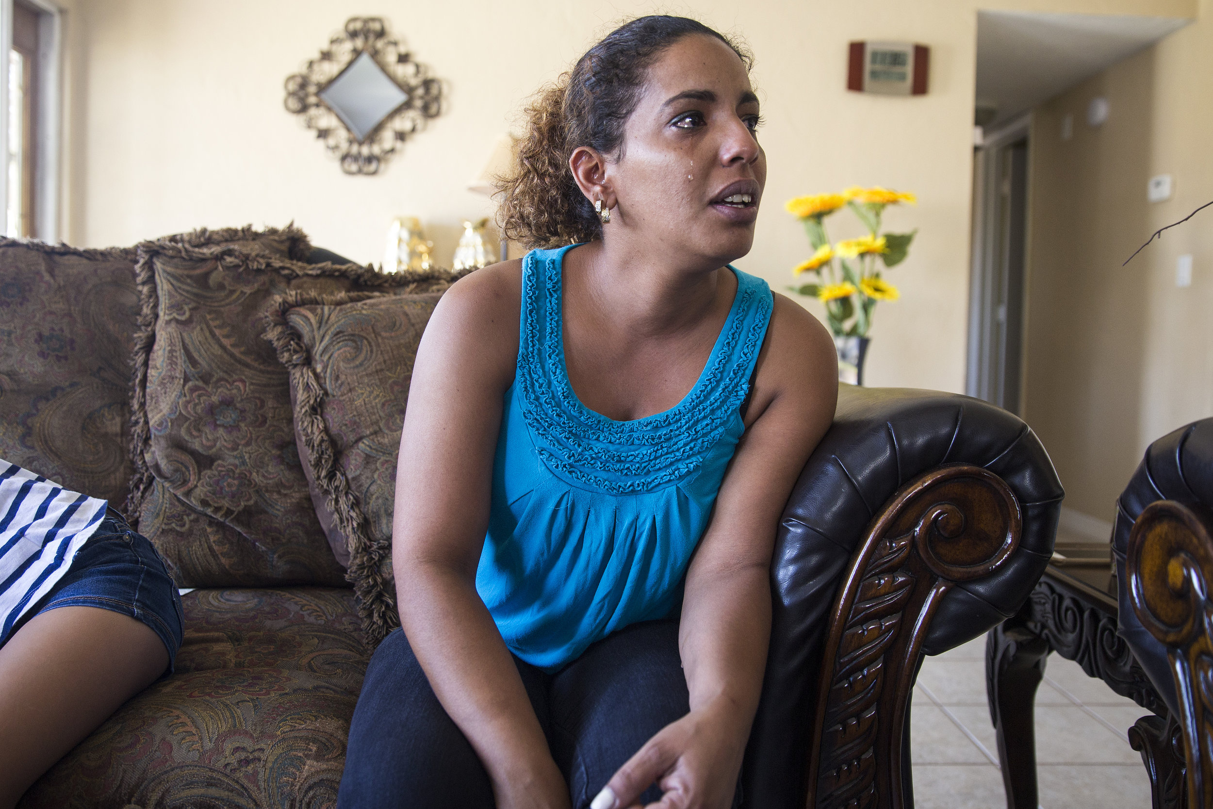  Lidicis Garcia Villafaña cries while remembering her partner of 14 years, Yusdel Moreno Iglesias, who died of a suspected carbon monoxide poisoning this past week. 