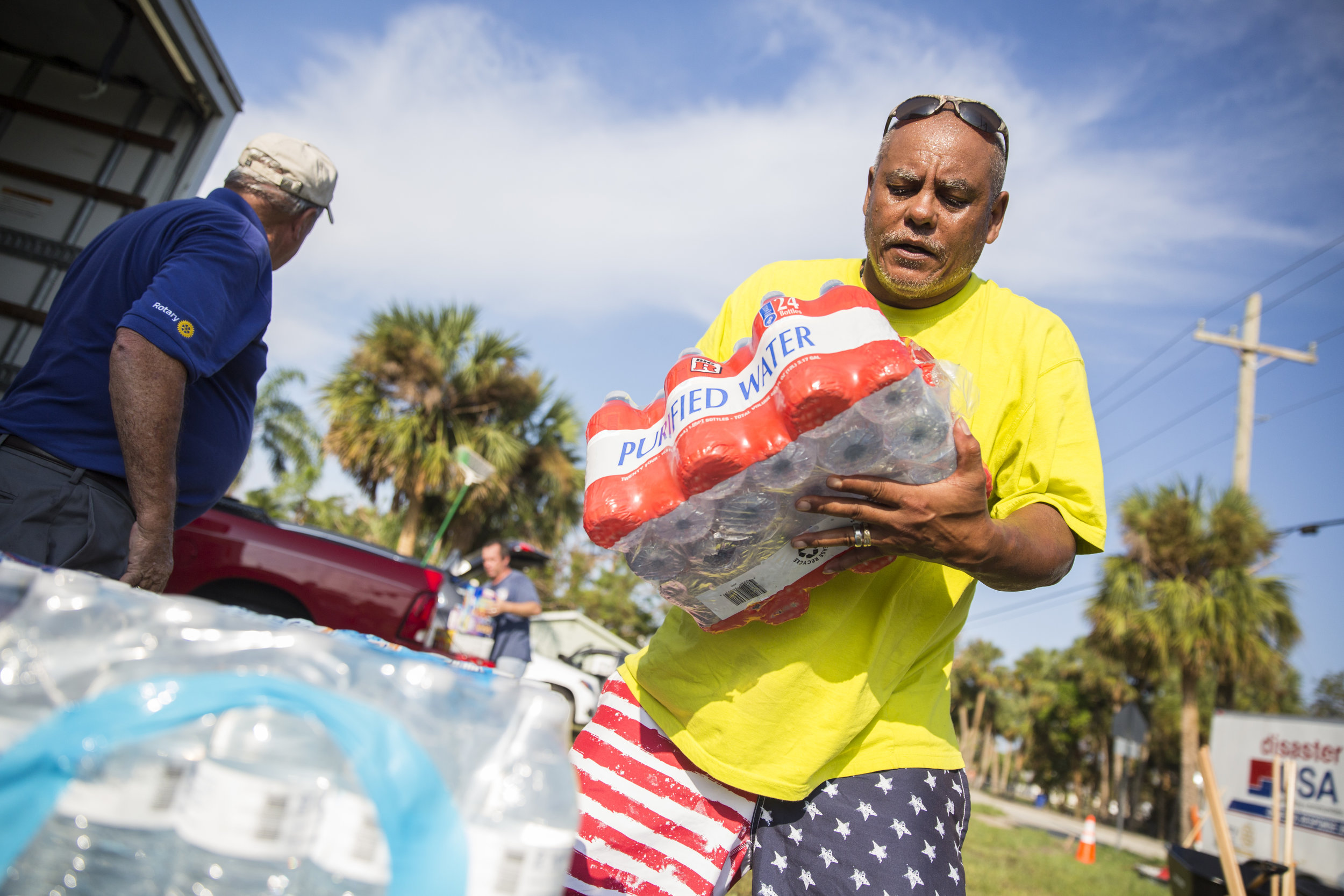  Rodney Malone helps unload a truck of provisions from the American Red Cross in Bonita Springs on Tuesday September 26, 2017. 