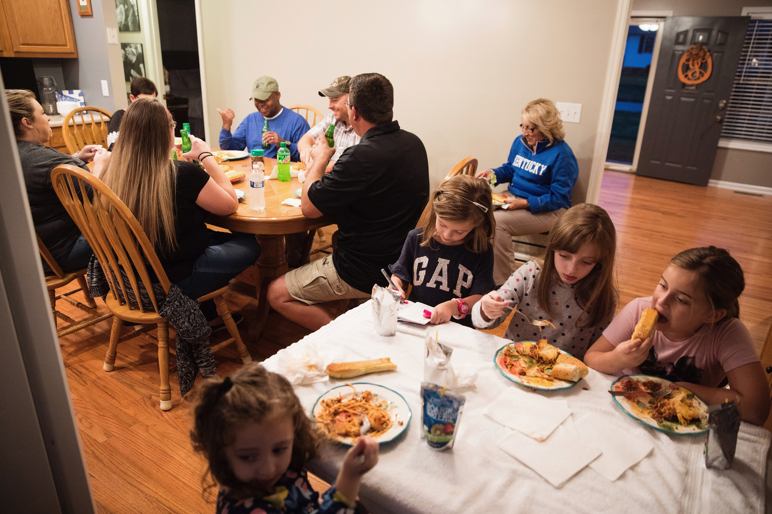  Wayne gathers with his wife Christy's side of the family for a Thursday night dinner. Wayne and Christy, who has been a deputy jailer for close to 30 years, have been able to cultivate a strong sense of mutual support within their relationship. "Hav