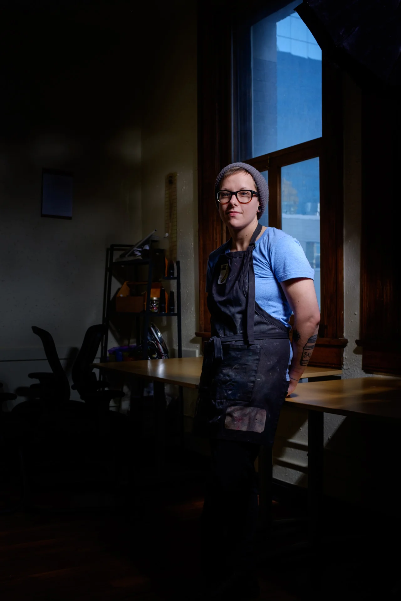 Regina, Treaty 4 Michelle Brownridge (Photo by Aidan Morgan, Intro by Caitlin Mullan)
Michelle was the first real friend I made in
University. The first time we hung out outside of art class her camera
came within inches of falling into a river. After recovering from this
near miss we took a bunch of ridiculous light painting photos. I feel
this first collaboration is a good analogy for what I admire most about
Michelle – no matter what unexpected challenge pops up, she always finds
a way to make a project happen.
Not so long ago I heard a term describing a new generation of makers
that immediately brought Michelle to mind: multipotentialite. Someone
who has no one true calling, but instead pursues multiple creative
directions with great success. Though I would describe her as an artist
first, she is also an entrepreneur, a photographer, a festival
coordinator, a fierce supporter of the local music scene, a mentor, a
writer, and she can compile a CADAC statistic sheet that will take your
breath away.
Our province needs people like Michelle. One of the things that first
drew me to her was her rejection of a concept we’d both heard growing up
- the idea that you have to move away from Saskatchewan to have a
meaningful career in the arts. Michelle believes strongly in being the
change that’s needed, rather than complaining about what’s wrong. She
will print in the studio until 5:30 AM to make sure an order of bags
gets to a client on time. She will always have a new podcast to tell you
about that will blow your mind, and if you think that your inkjet
printer is beyond fixable – trust me – she will find a way. KC: What kinds of projects are you involved in right now? I am involved in a few different projects right now… Since August 2015 I have been the Festival Coordinator for a city-wide, multidisciplinary arts festival called The Caligari Project: Festival of German Expressionism. The Caligari Project has been holding events since last February, but the bulk of the activities happened in October. We had over 25 different film, music, theatre, visual arts, dance events and it’s not quite over yet, there is still going to be a filmmaking workshop for youth held by mispon and then on December 17 we are partnering with FadaDance on their annual Christmas party which will also serve as the wrap up party for the festival. I am super pumped that the Fada party is a part of Caligari, it is always my favourite party of the year, bar none, and this year will be no exception I am sure! The theme is “Drunk on German Expressionism”. The Caligari Project has been an amazing thing to be a part of and the board and I are already starting to talk about what we could do next! I am also one of the co-founders of Articulate Ink, Regina’s only non-profit, publicly accessible printmaking studio, so in addition to my work with the Caligari Project this year I have also been working quite steadily there printing, making t-shirts for bands and other non-profits mostly. Articulate Ink recently received a sizeable capital donation from Wawanesa Insurance and we are using that money to do a full revamp of the studio space, just kicking it up a notch, installing ventilation, some new pieces of equipment and storage space for our members, so it has been a busy fall making that all happen little by little. Also, Karli Jessup, another Articulate Ink co-founder and I, have recently both started working part-time in a commercial print shop that we had been interning at for a couple months over the summer, Eagle Printing. Articulate Ink developed a relationship with Eagle Printing through the ArtsVest program last year… Blair Baron (who owns and runs the shop) has some amazing letterpress equipment over there, including two Heidelberg Windmill presses, but he mostly does die cutting and numbering jobs with it, not a lot of printing, and Articulate Ink was looking for a way to access some press time and equipment to do some printing for ourselves and other clients and viola! The partnership is a great match and we are now learning all the aspects not only of letterpress printing, but of all the other techniques that are offered at Eagle including digital printing, offset lithography, the business of running a commercial print shop and so much more, there is tons to learn! KC: What’s your day job? What do you like about it? What’s challenging? My day job these days mostly consists of working at Eagle Printing and doing commercial print jobs at Articulate Ink, which I love. I love making things and when you are printing, whether it be for commercial or fine art purposes you are definitely making something and it is rewarding to physically see what you’ve accomplished at the end of a day. Occasionally, I am hired to do event production or communications consulting work on contract, so for example, right now I am working with Heritage Saskatchewan to develop a social media strategy and with the Museums Association of Saskatchewan to help them create a new communications strategy. I worked for almost four years as the Communications Coordinator at SaskCulture from 2012 to 2015, that is where I got my background in communications and it is nice to be able to work with other non-profit cultural organizations to assist them with their communications needs. I really like all of the work I do as a communications consultant, I like connecting with organizations and people and helping them be more efficient and strategic in their communications efforts. After a year of being almost totally self-employed, going back into a nine-to-five type of situation at Eagle Printing (even though it is only a few days a week) has been a little challenging, but I also really like the structure that it gives to my schedule. It has really required me to get and stay organized and prioritize all the things I need to get done over the course of the week. The super challenging thing about working at Articulate Ink is that we get paid solely on commission for the jobs that we print, we don’t have enough operational funding yet to be paid a salary or for any of the administrative work that we do so that inconsistency can definitely be frustrating at times. KC: What’s important to you? I think that community is really important to me, whether that be family, friends, colleagues… One of the things about being a printmaker is that we often work communally because of the high cost of the equipment and studio facilities we require, so I feel that there is a sense of community that is often built into the medium and that is what we’ve tried to build with Articulate Ink, not only a physical studio space, but also a community of print-minded people. Art is also really important to me, it is a huge part of my life and even though I haven’t produced a huge amount of work in the last five years I feel that being an artist informs how I navigate the world and I am always experiencing things through the lens of being an artist and that is often what keeps me going and motivated to do what I do. KC: What do you like most/least about Regina? What I like most about Regina is the arts community. When I moved here in 2005 from Weyburn to go to University, it was never really my intention to stay for an extended period of time, but as I became more and more a part of the arts community, and Articulate Ink flourished, it became difficult to think about moving somewhere new and starting over just for the sake of not being in Regina. I think I’d like to move somewhere new, even temporarily, in the future to go to grad school, but that is way down the line, I’m still paying off my undergraduate degree. The thing that I like least about Regina is that it is essentially just a bigger small town in some ways, racism is still a rampant problem here, as well as LGBTQ discrimination and even though I’ve never personally had any problems in the past, I know of people who have, and being a visibly queer person sometimes makes me nervous because I know there are folks around who might take issue with me just being me, so I have my guard up sometimes and I don’t like that. KC: What is your impression of Saskatoon? I really like Saskatoon! During my time at SaskCulture I got to spend a decent chunk of time working in Saskatoon for Culture Days and other initiatives and I met some great people, ate at fantastic restaurants, visited awesome art galleries etc… Saskatoon seems like a really vibrant, growing city. I am always impressed by the landscape, the rivers, the bridges - it is a particularly beautiful city in my opinion. I generally jump at any chance I get to go to Saskatoon, I like spending time there. KC: How do you survive the winters? I really used to hate winter bitterly and then I bought a full-fledged winter parka a few years ago and my opinion of winter shifted a bit, so I suppose I survive the winters by investing in really good, warm winter gear. It really takes the bite out of the cold. I still like to walk a lot in the winter and be outside and we have an ice skating rink about half a block from our house and one downtown in Victoria park so I go ice skating when I get the chance and I always feel that is something special that I only get to do in the winter. I find that skating invigorates me in the depths of winter somewhat. From the Proust Questionnaire: Which talent would you most like to have? The talent that I would most like to have is to be able to play a musical instrument, which I cannot! I took guitar lessons for about three years in high school and let’s just say that I didn’t really have an aptitude for it. I love music, it is a huge part of my daily life and I would really like to be able to play guitar or piano or something but I haven’t really been able to figure out yet. I haven’t given up yet though - there may be an ukulele in my future! Links:
www.articulateink.ca
www.eagleprinting.ca - (website in progress!)
www.caligari.ca Social media:
Instagram: @pensiveprinter, @articulaterinker, @eagleprintingyqr Twitter: @pensiveprinter, @articulaterinker Articulate Ink - HomeWant some studio time to work on your print for the upcoming Caligari Print Exchange? Come hang out with us this Wednesday!articulateink.ca