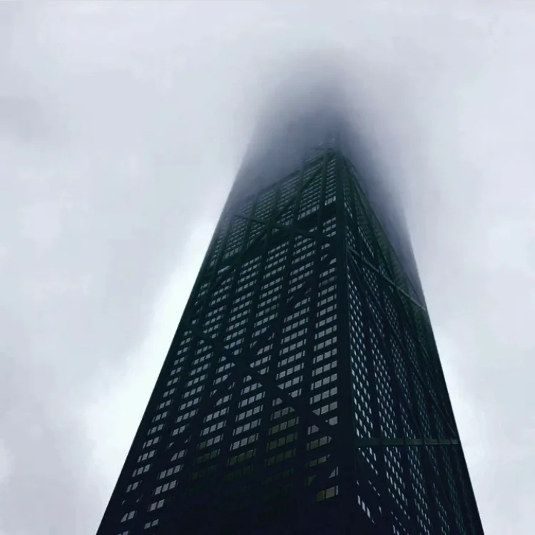 “I follow the brick pavers that cut a path across our yard and imagine heavy clouds concealing the city’s height, lingering around the tops of buildings on Michigan Avenue just a mile or so in the distance.” Original photo credit: Wences Sanz