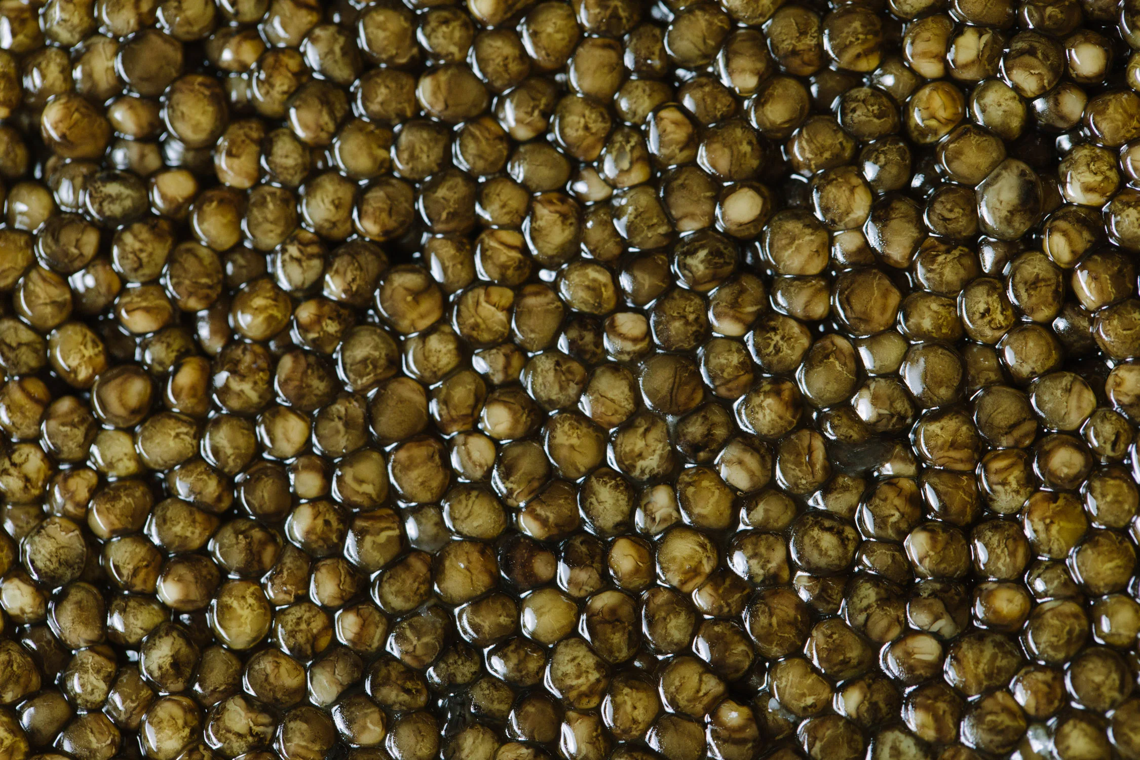 Supreme Supreme is our best grade of California white sturgeon. This hand-selected caviar is truly delectable; its firm beads that burst with intensely rich and nutty flavors. This superior buttery caviar has medium to large beads and ranges from amber to gold in color.