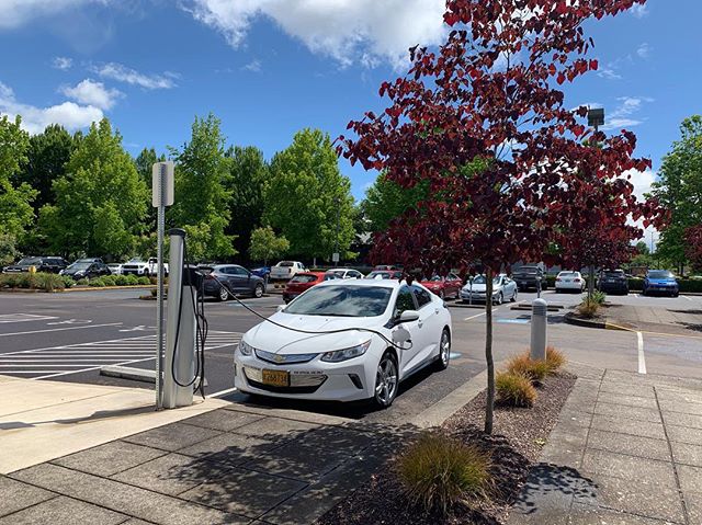 From @odoenergy 
Electric vehicle charging on a late spring day. ☀️💐🔌 #electricvehicle #chargeupandgo #oregon #oregonenergy #GoElectricOR #electriccar #chevyvolt #volt #EV #zeroemissions