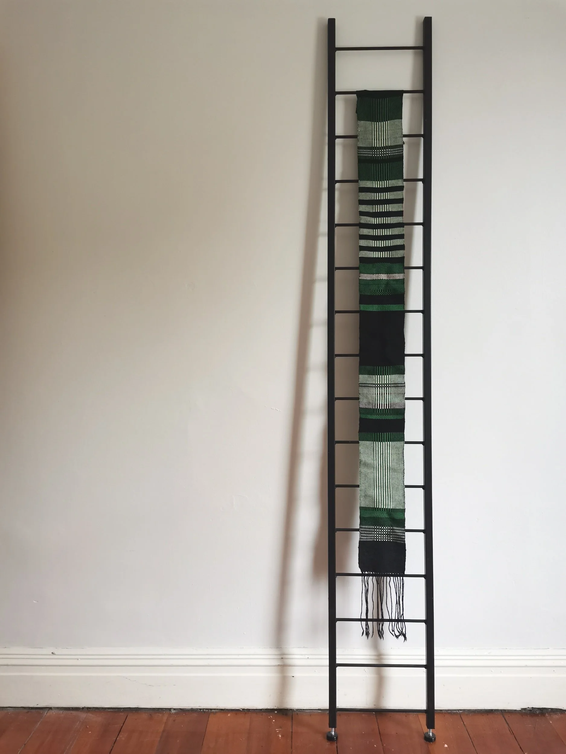 Green, white & black scarf.