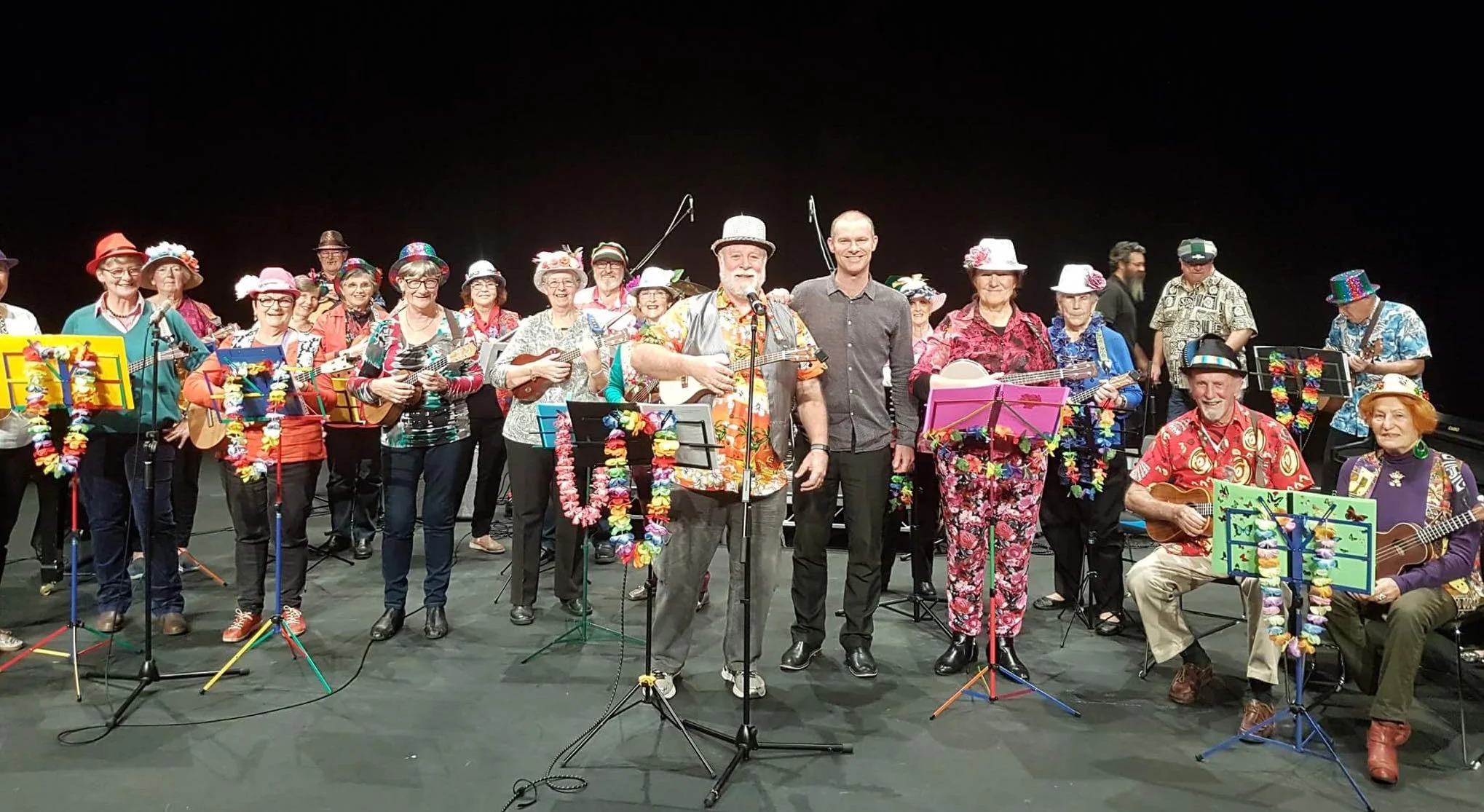 The full ukulele ensemble, what a colourful bunch!