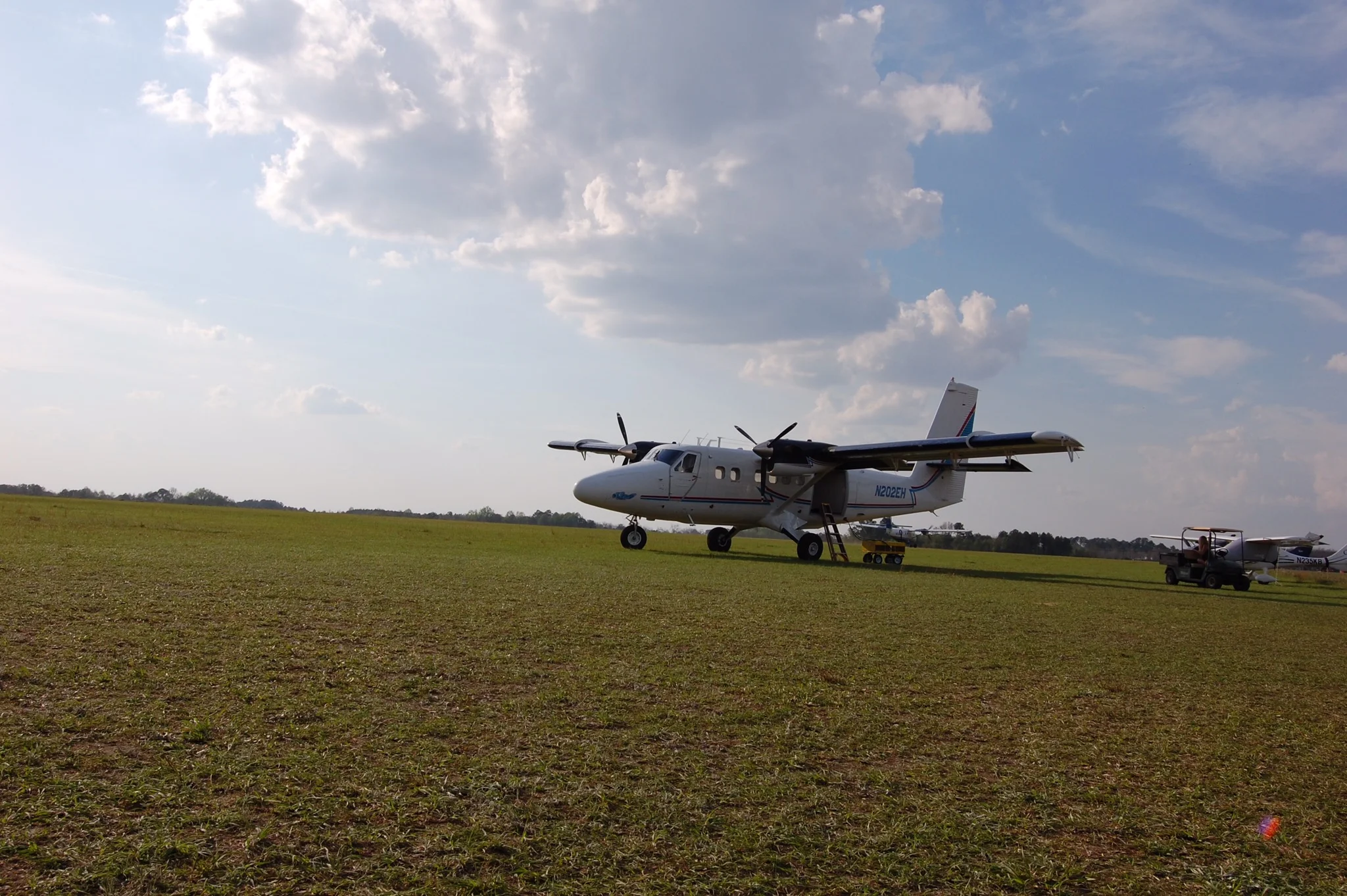 Grass strip runways, camp-outs and bonfires are all a part of the skydiving experience!