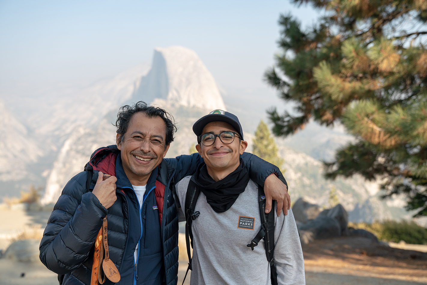 Michael and his dad pose for a photo in Yosemite, CA. 2018
