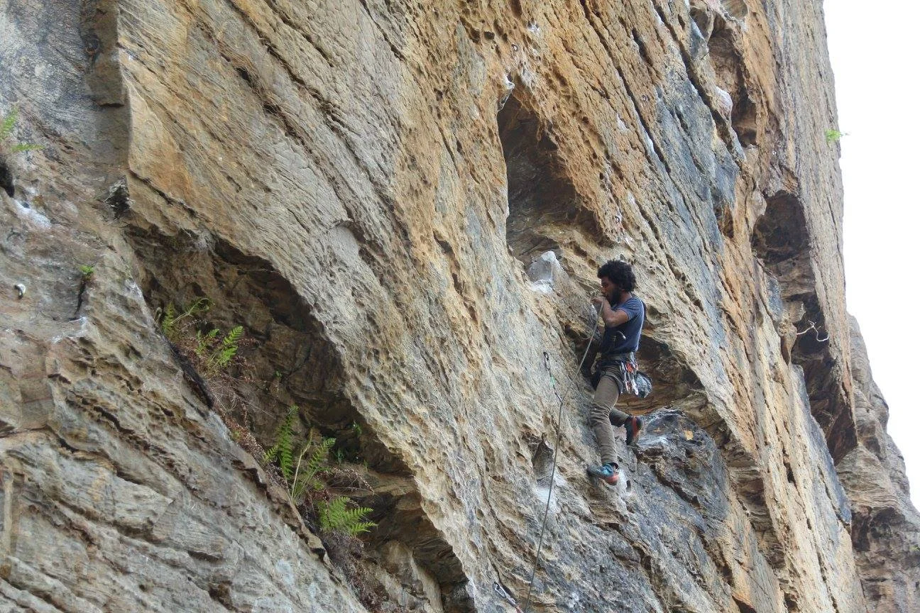 Photo of Justin sport climbing in the Red River Gorge, Slade, Kentucky (Photo credit: Justin Forrest Parks)