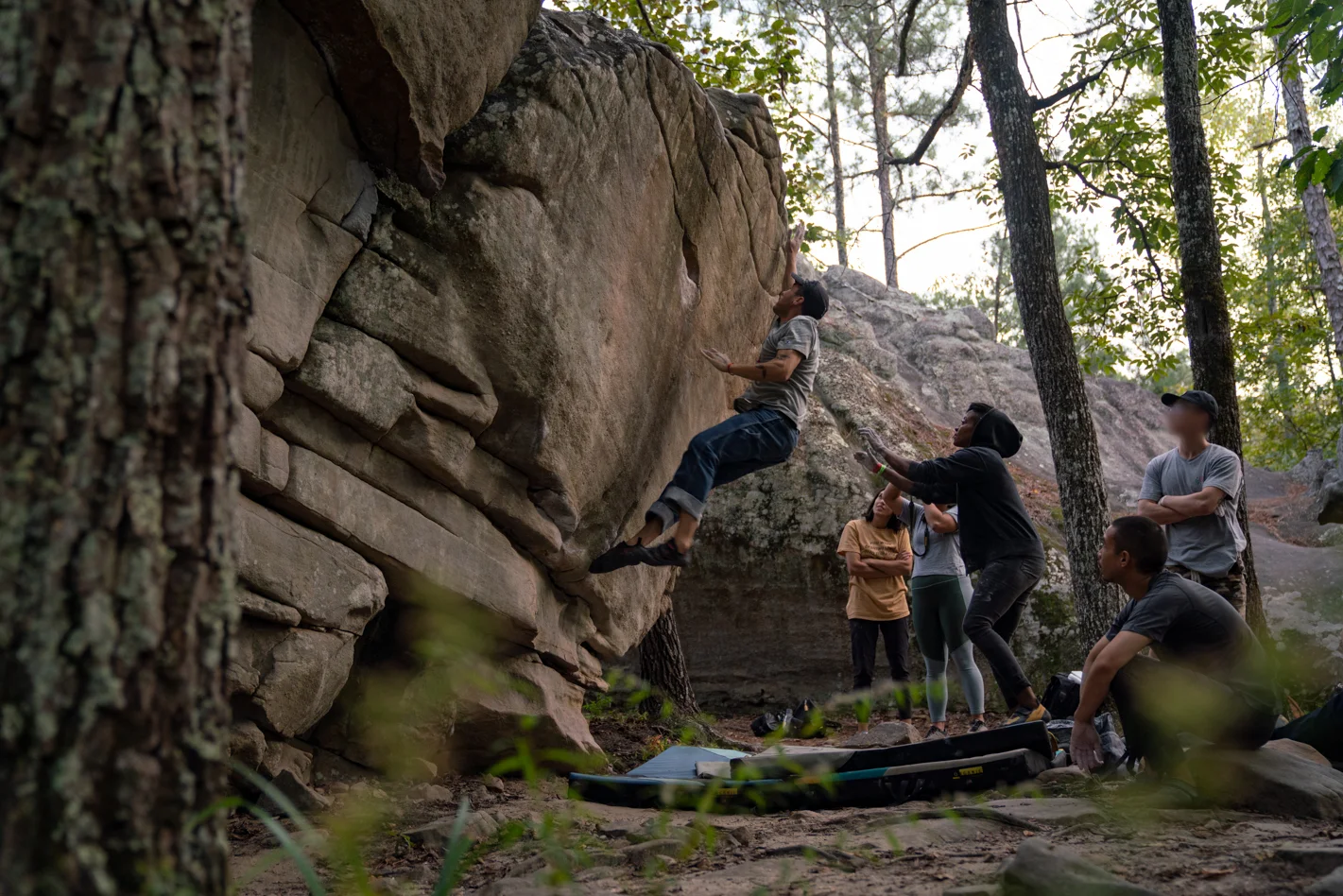 Artist and climber Hiram Trejo of mas.world magazine takes a leap at Color the Crag. Photo: Michael A. Estrada