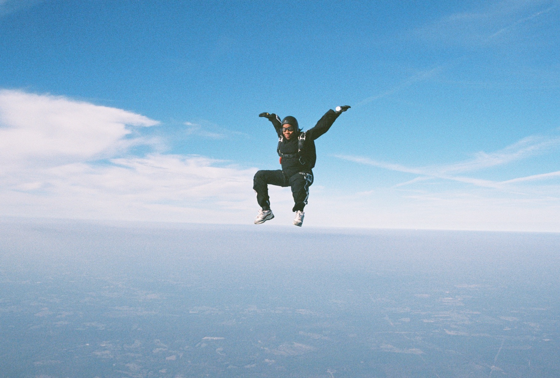 25-year-old Sharon enjoys a sitfly jump in a vintage, baggy free-fly suit. Photo courtesy: Sharon Calhoun