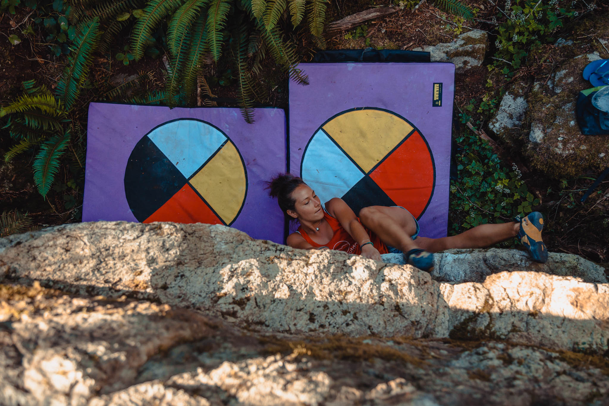 Indigenous Womxn Climb co-founder and Native Women’s Wilderness ambassador, Erynne Gilpin , goes for a toe hook on a bouldering project. Photo courtesy of K.l. Peruzzo