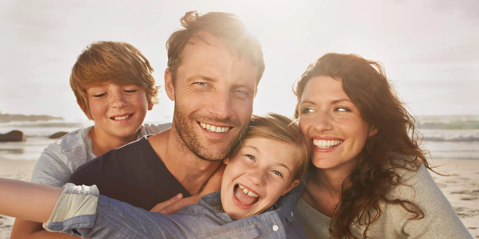 Smiling beach family.jpg