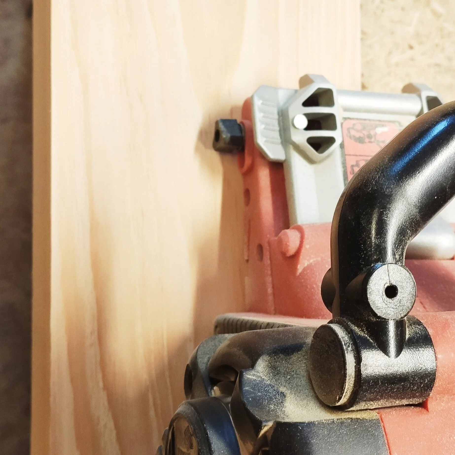 working hard on the bed in douglas, sanding the surface in my workshop.