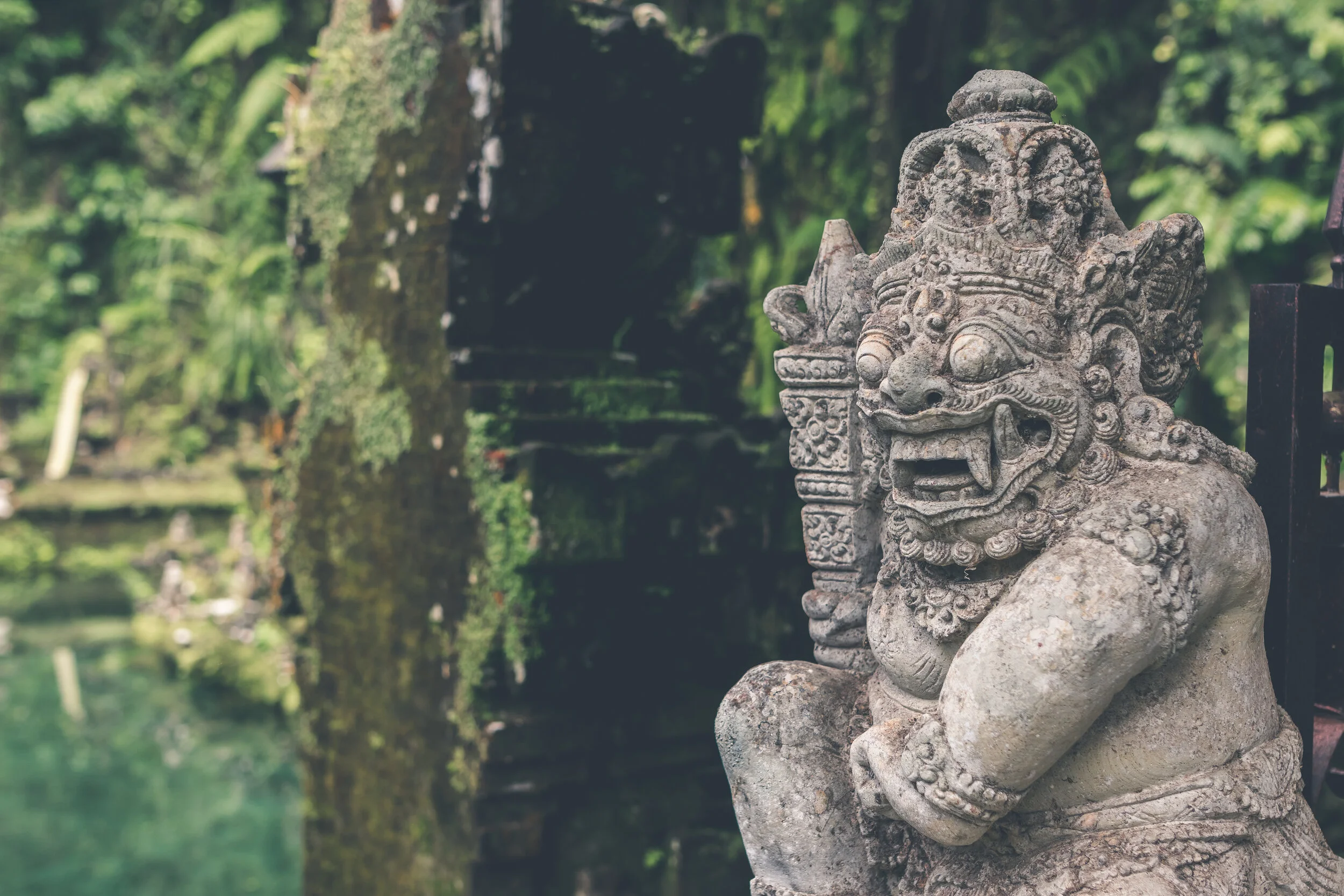 Hindu stone statue in the balinese temple. Tropical island of Bali, Indonesia.