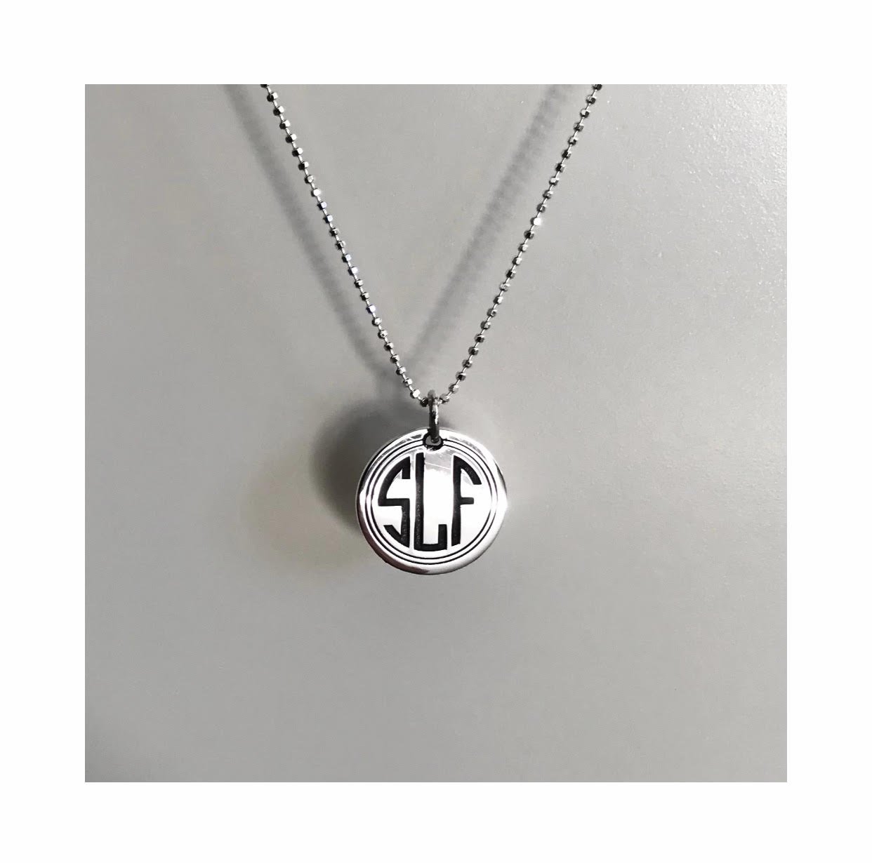 silver deco pendant.jpg