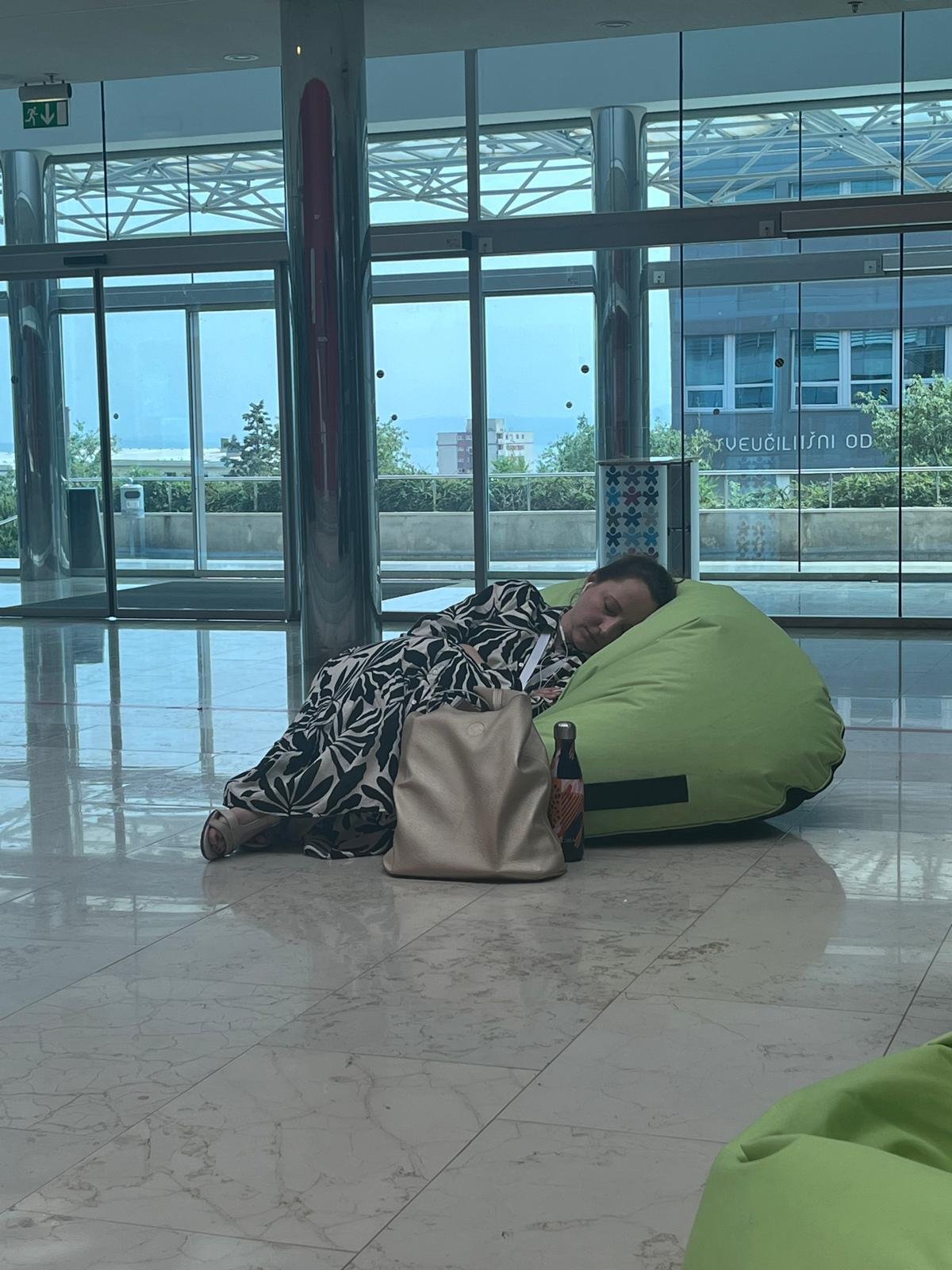 Passing out in between conference roundtables.JPEG