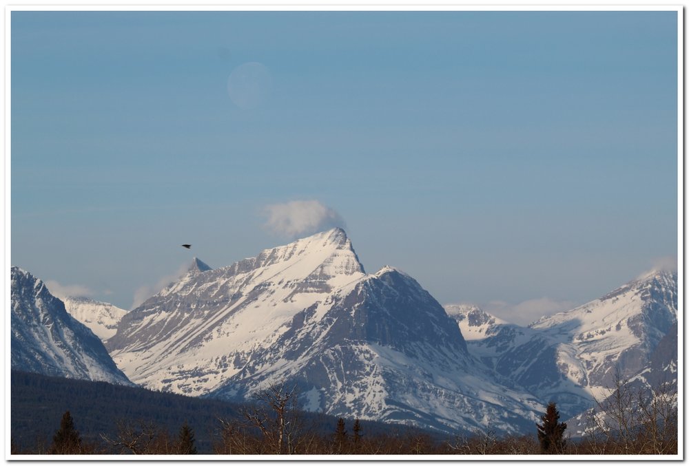 Moonset over Many Glacier