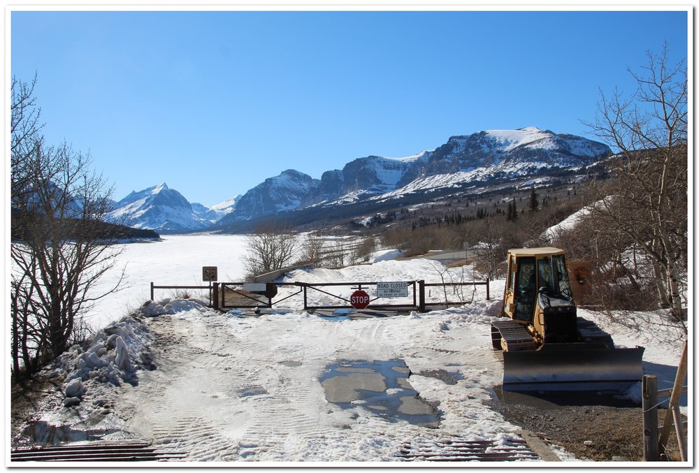 A bulldozer has cleared the drift at Sherburne Dam so that park crews can eventually start working past the gate