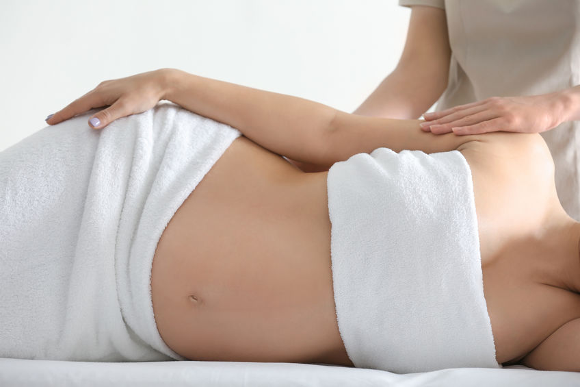 Pregnancy massage treatment for an expectant mother