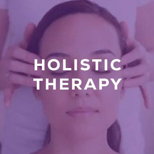 woman relaxing having her head massaged