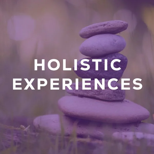 stones positioned on top of each other representing balance in a calm setting