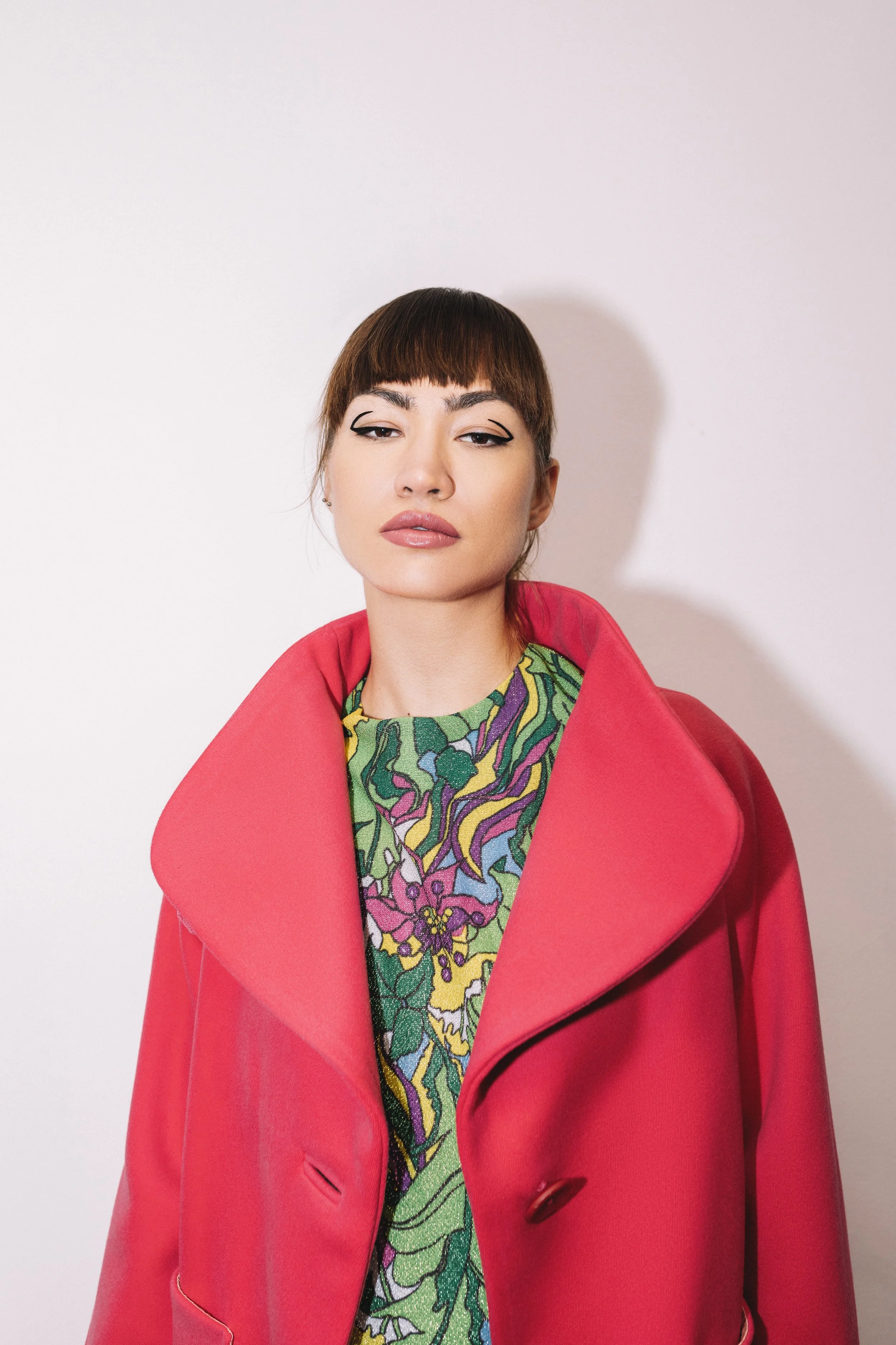 Shruggler - featured in Vogue