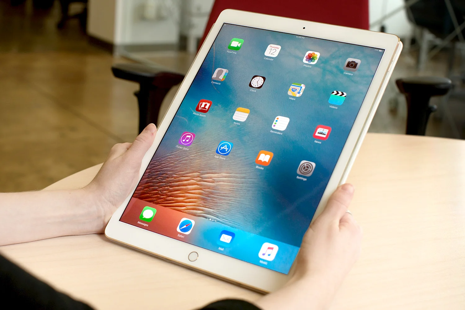 HandsHoldingIpad.jpg