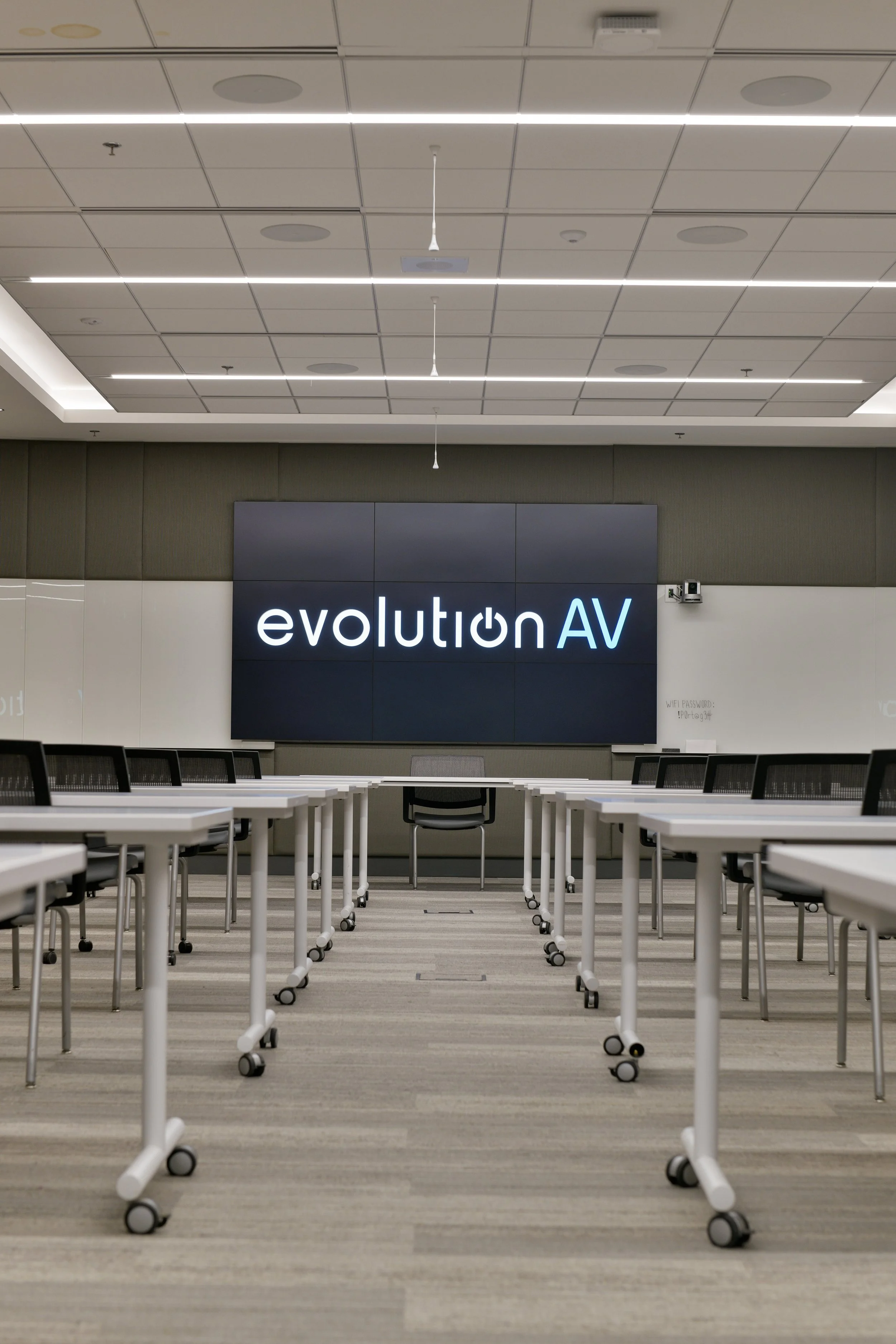 corporate office shared space with LED video wall showcasing branding