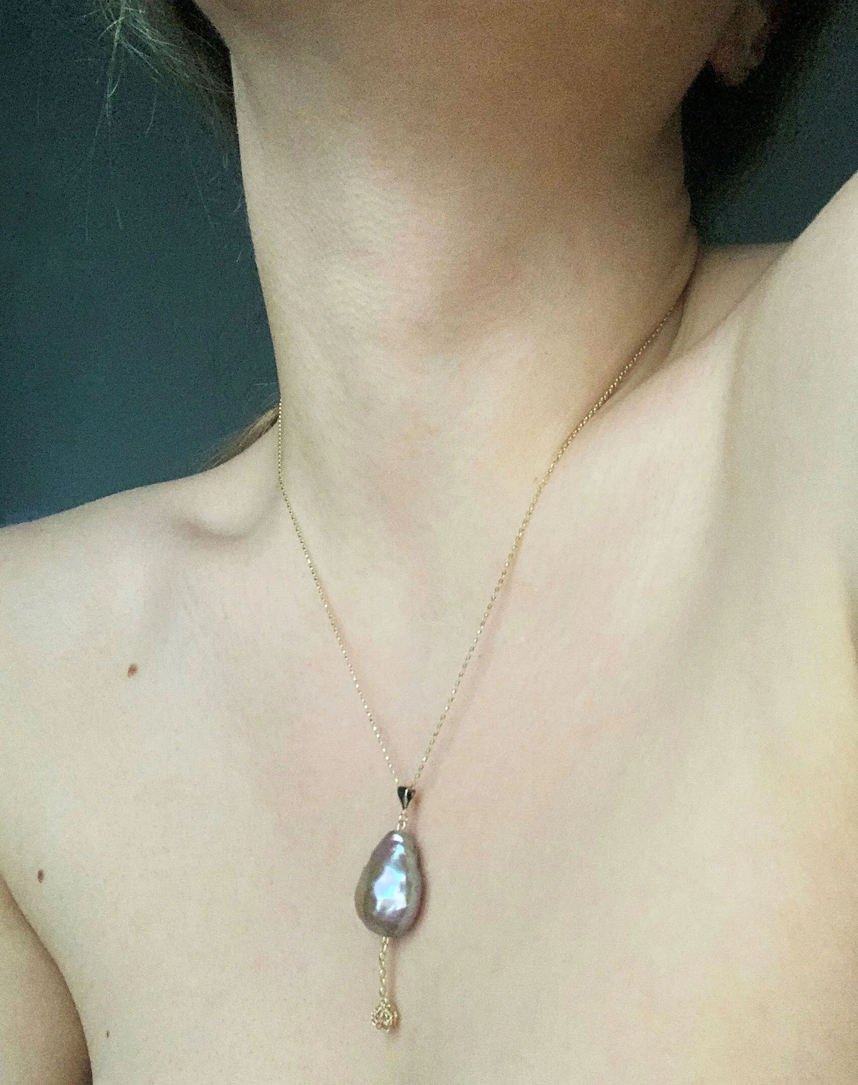 contemporary hand crochet gold pendant with large Baroque pearl. Unique yet affordable, simple yet elegant