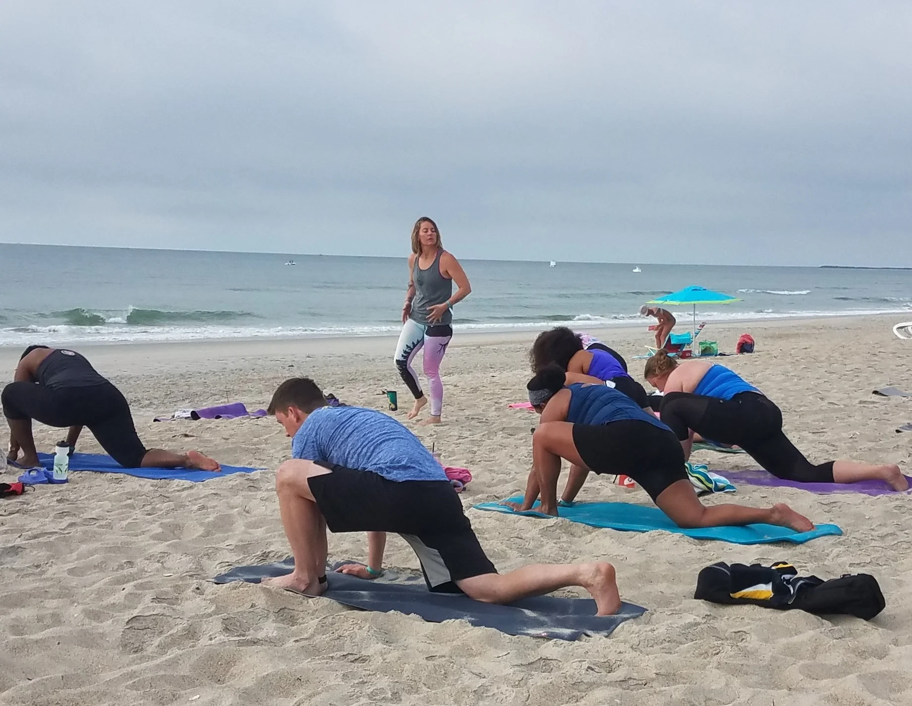 H2Om Yoga on the beach at the 2017 WaveOne Open Water Camp.