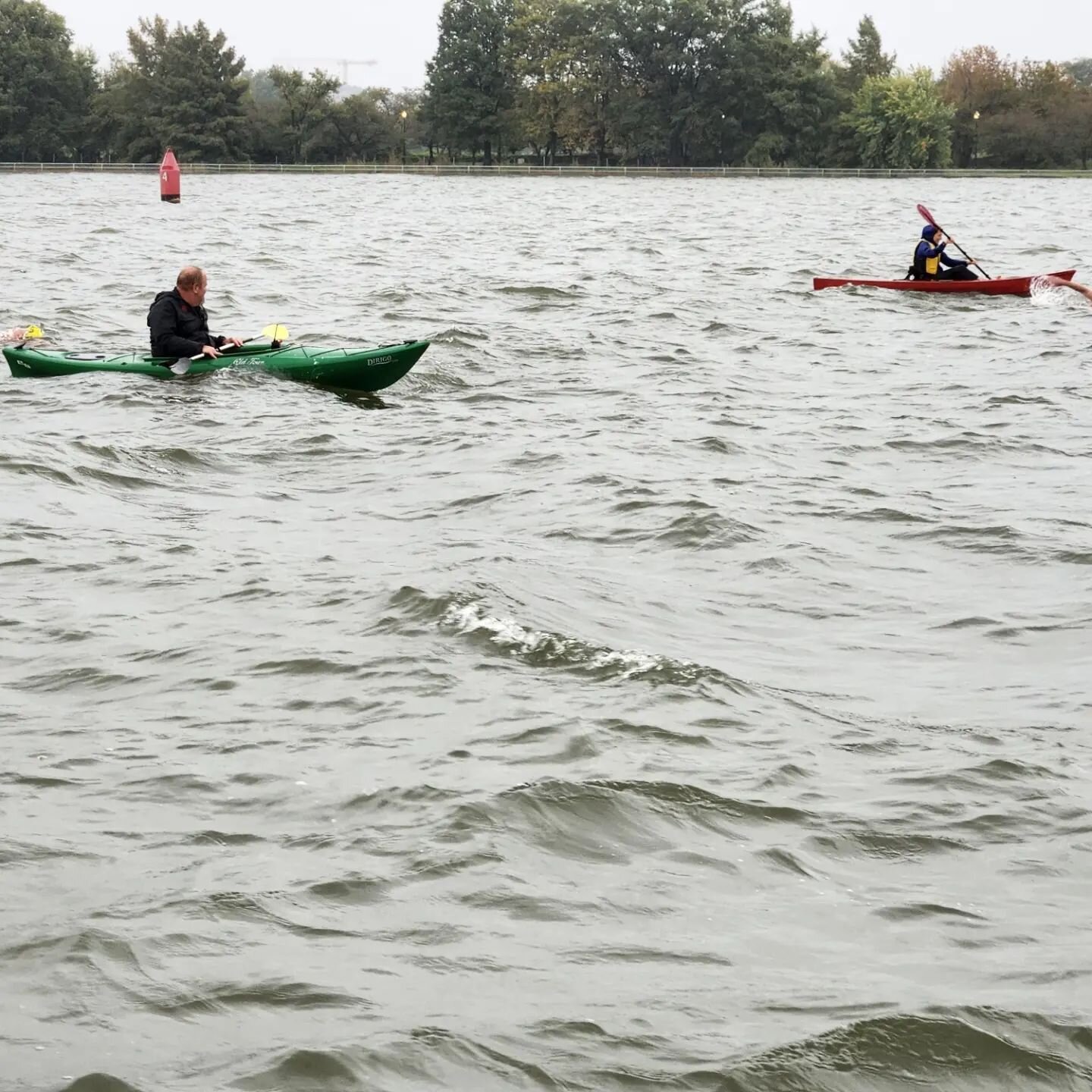 Passing the Hains Point buoy. Susan, Joe and John in a pod. #waveoneopenwater