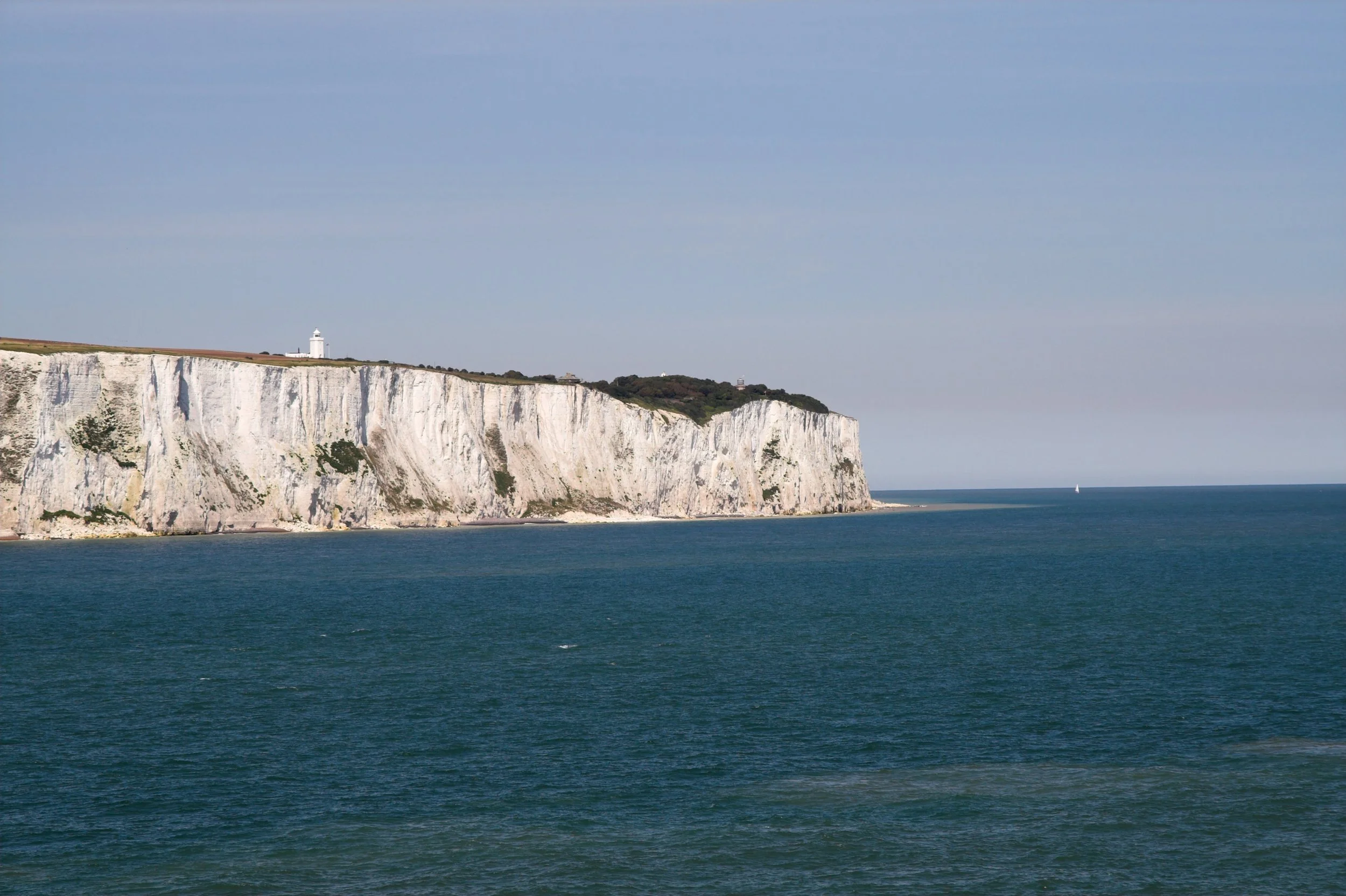 Geometric drawing of an outline square with sections divided by vertical, horizontal, and diagonal lines.